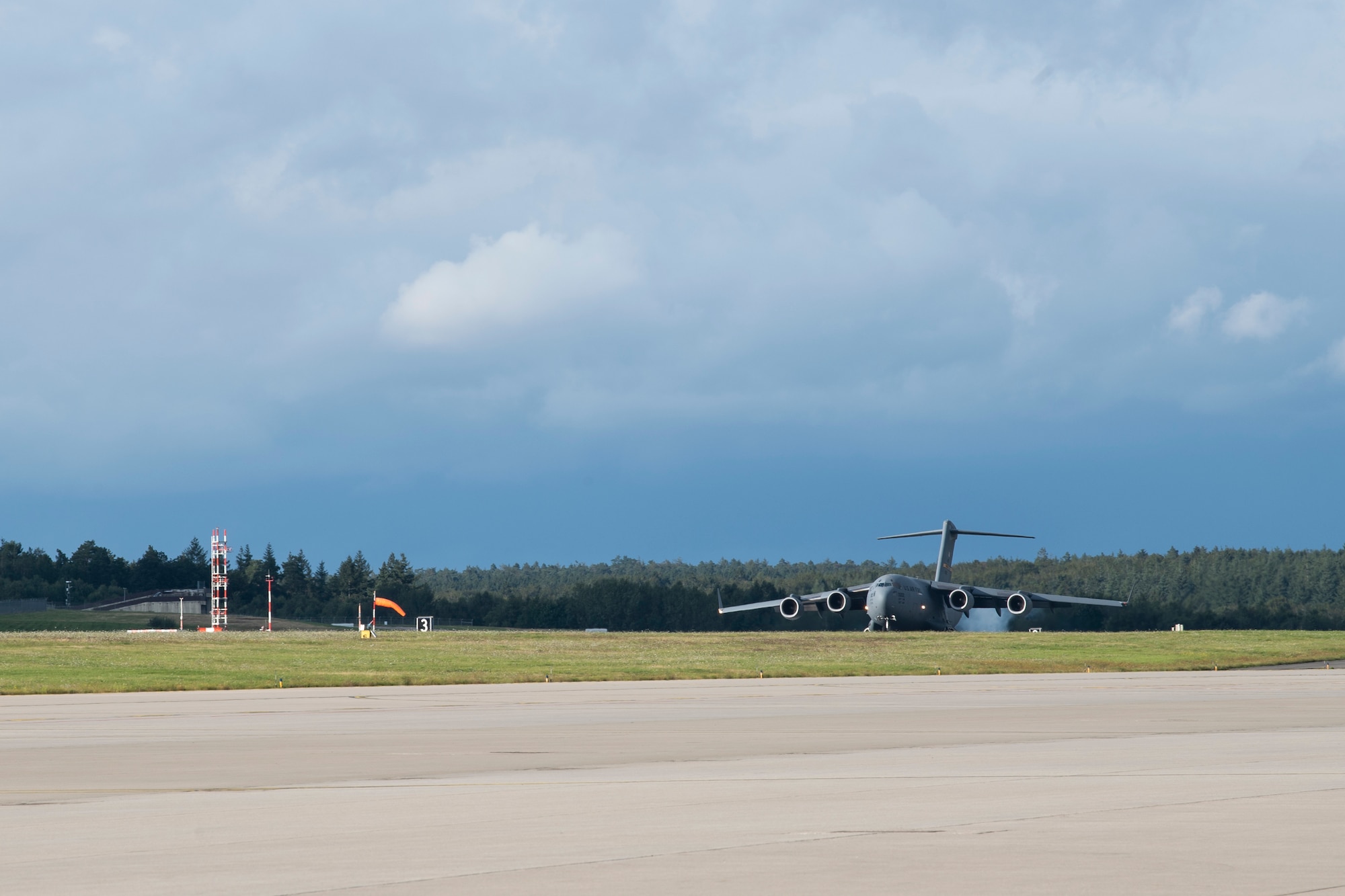 A U.S. Air Force C-17 Globemaster III from Joint Base Charleston, South Carolina, lands on the flightline of Spangdahlem Air Base, Germany, Aug. 27, 2021.