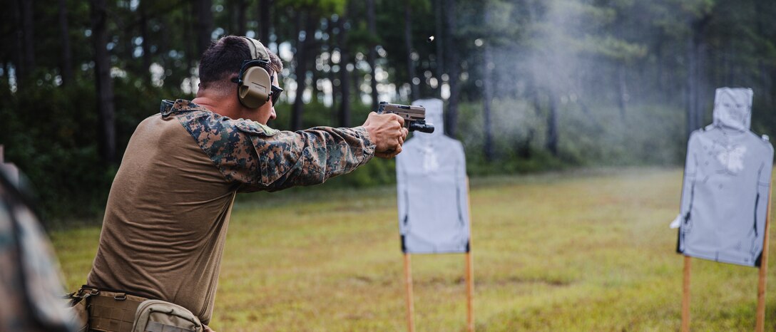 U.S. Marine Corps Capt. Eric Christopherson, 3rd platoon commander, Force Reconnaissance Company, 2d Reconnaissance Battalion, fires at a target during a live-fire range on Camp Lejeune, N.C., Sept. 9, 2021.