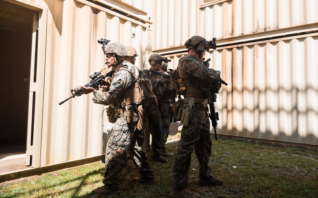 U.S. Marines with Force Reconnaissance Company, 2d Reconnaissance Battalion, 2d Marine Division, provide security during military operations on urban terrain training on Camp Lejeune, N.C., Sept. 12, 2021.