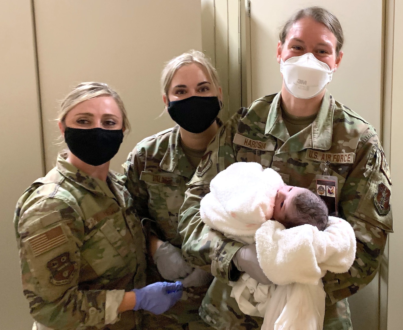 Wyoming Air National Guard Administrative Specialists Senior Master Sgt. Jennifer Ballenger and Tech. Sgt. Shyloh Vallot with New York Air Guard, 2nd Lt. Kristin Harosia just after they assisted the emergency delivery of a baby born to an Afghan guest of Operation Allies Welcome at McGuire-Dix-Lakehurst Air Force Base, New Jersey.