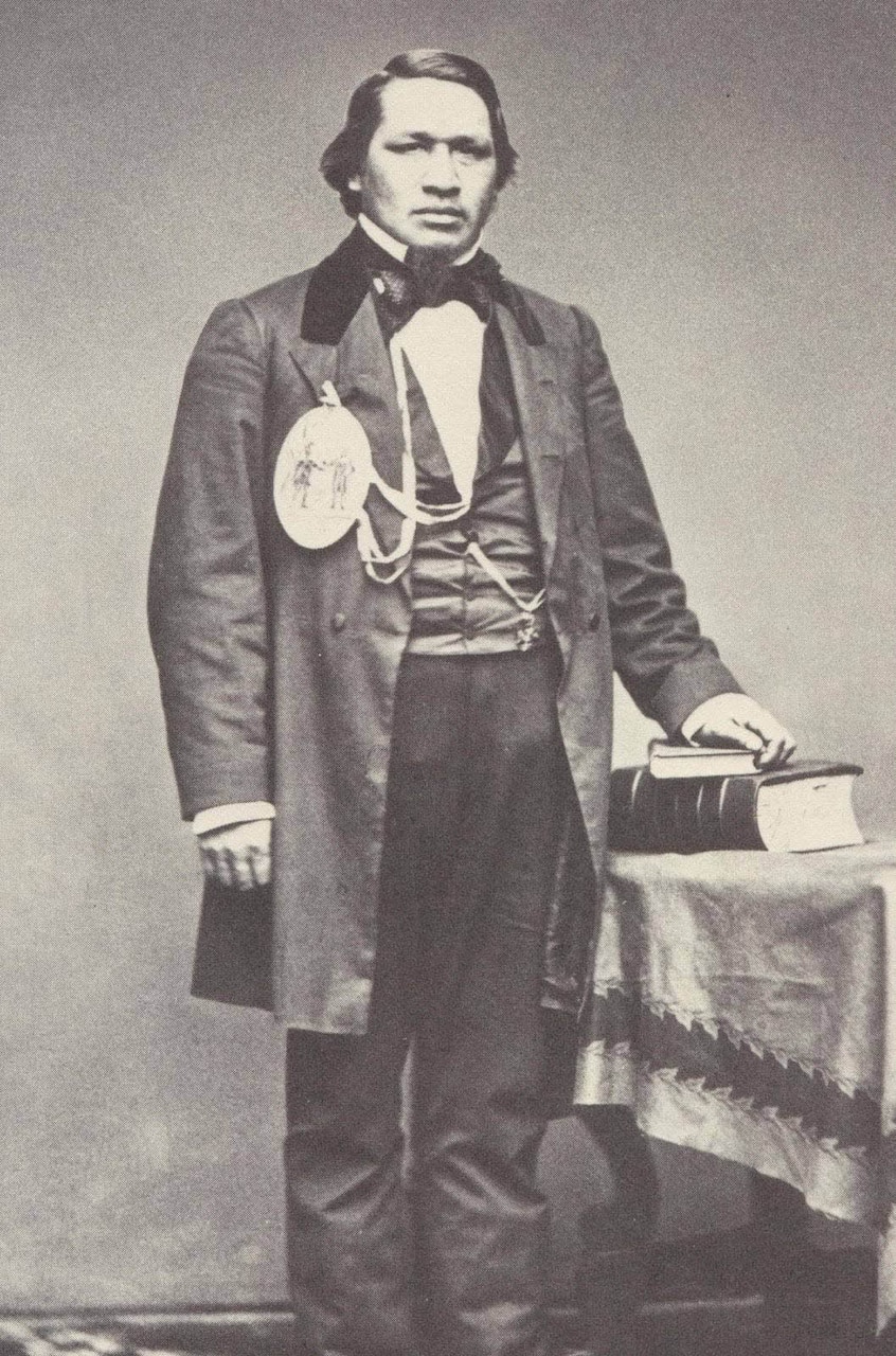 A man poses for a portrait.