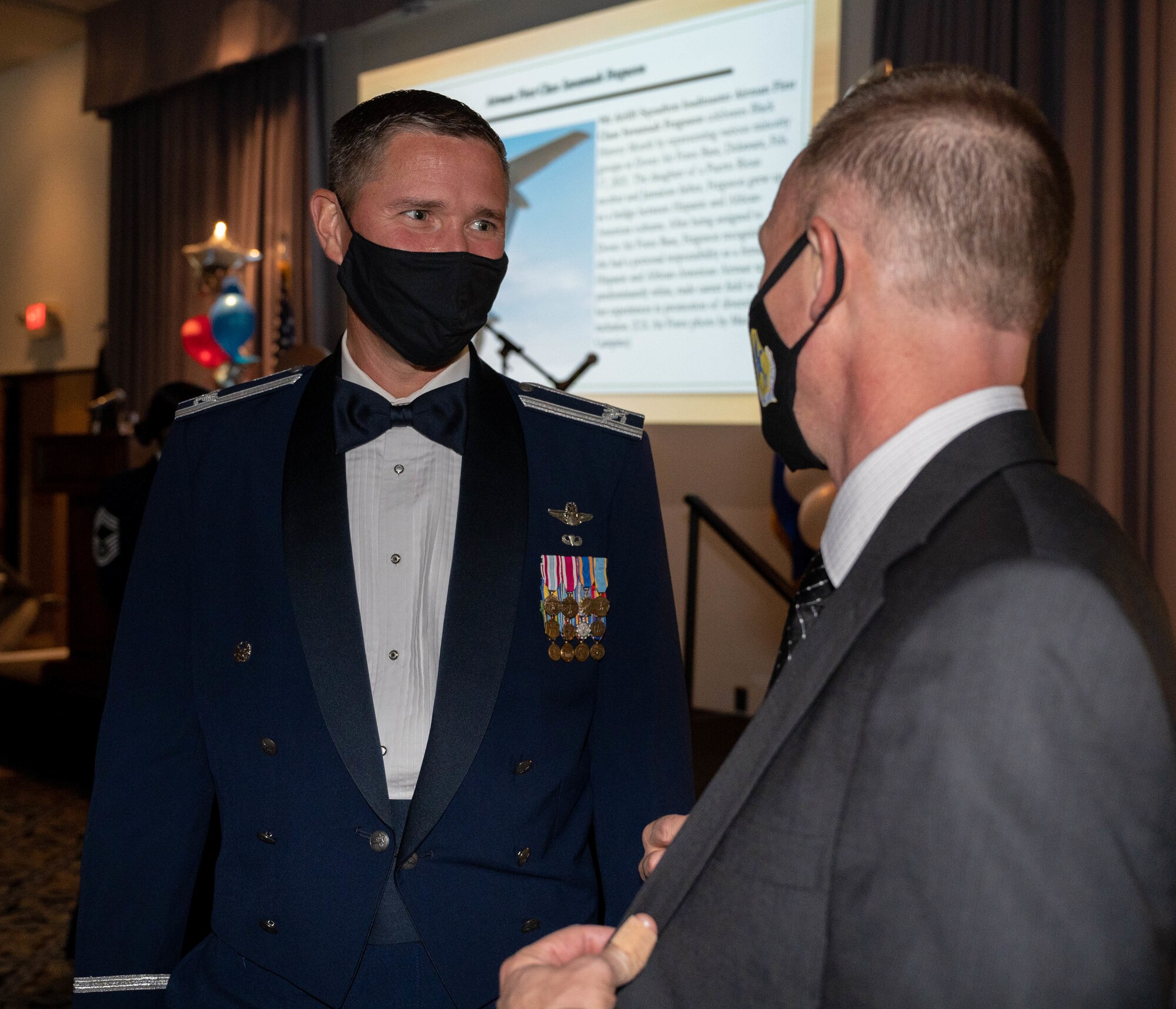 Col. Shanon Anderson, 436th Airlift Wing vice commander, speaks with Craig Lindstrom, 436th AW director of staff, during the 2021 Air Force Ball at Dover Air Force Base, Delaware, Sept. 18, 2021. The Air Force Ball is an annual event held to celebrate the Air Force’s birthday. (U.S. Air Force photo by Senior Airman Faith Schaefer)