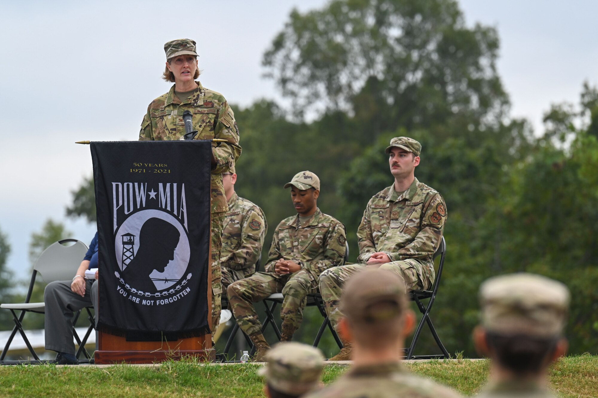 A woman gives a speech