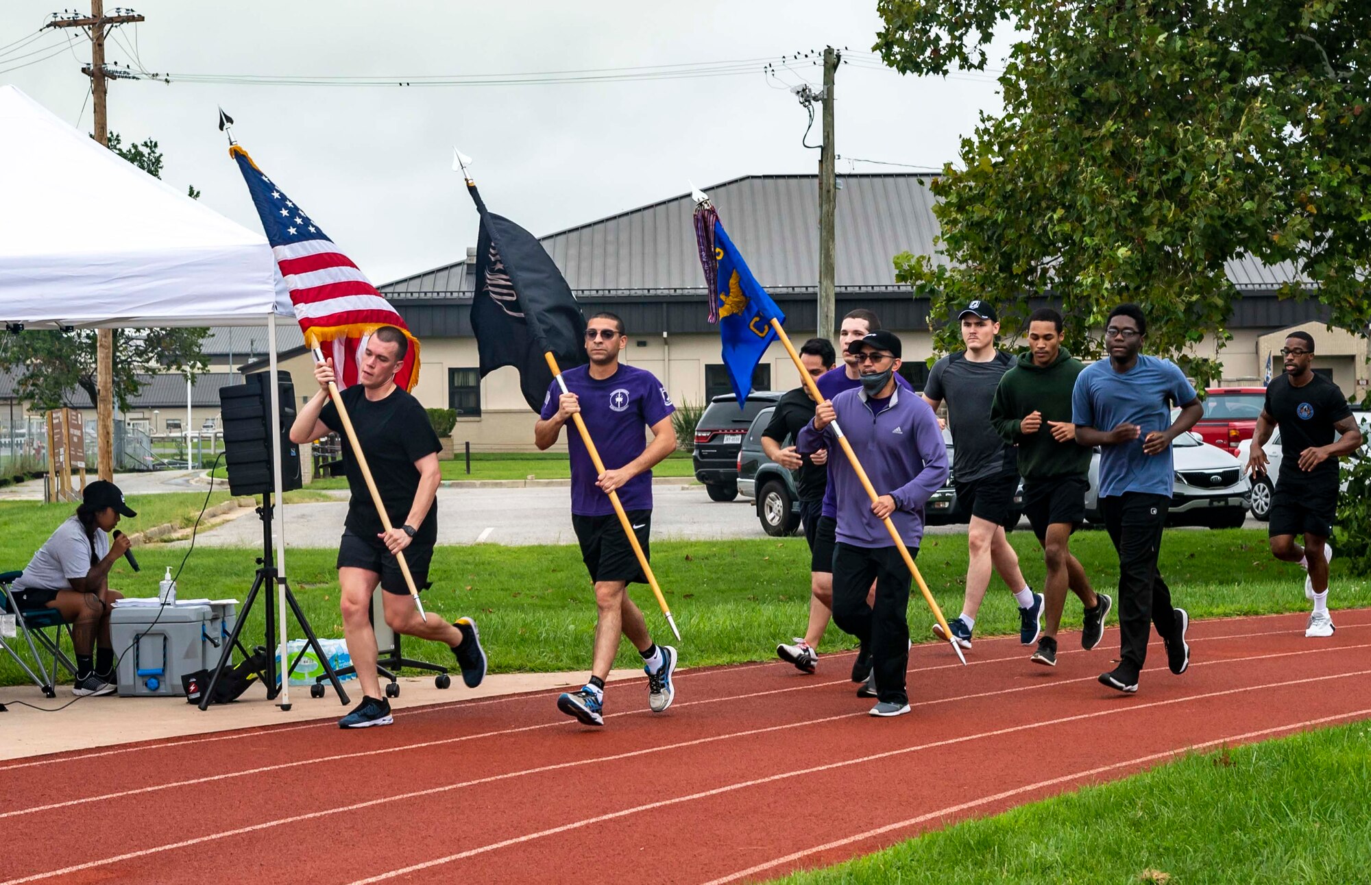 Members of the 436th Communications Squadron participate in the 2021 POW/MIA memorial run on Dover Air Force Base, Delaware, Sept. 17, 2021. Units from across Dover AFB ran in 30-minute increments for 12 hours leading to a retreat ceremony commemorating National POW/MIA Recognition Day. (U.S. Air Force photo by Senior Airman Stephani Barge)