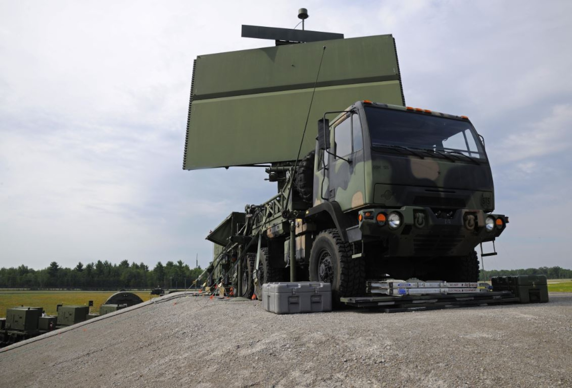 Officials from the Three-Dimensional Expeditionary Long-Range Radar Rapid Prototyping program office, headquartered at Hanscom Air Force Base, Mass., are currently utilizing the “SpeedDealer” strategy to acquire a production-ready, commercially available upgrade for the TPS-75 radar, pictured on a transport vehicle here. To support this effort, the team awarded a $4 million integration contract with production options to Northrop Grumman Corp. Sept. 17. (U.S. Air National Guard photo by Senior Airman Ryan Zeski/Released)