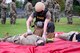 Airman 1st Class Christian Moneypenny, 2nd Civil Engineer Squadron firefighter, provides medical care to an injured actor during an active shooter exercise at Barksdale Air Force Base, Louisiana, Sept. 16, 2021. Firefighters are responsible for both firefighting and emergency medical response as first responders. (U.S. Air Force photo by Airman 1st Class Jonathan E. Ramos)