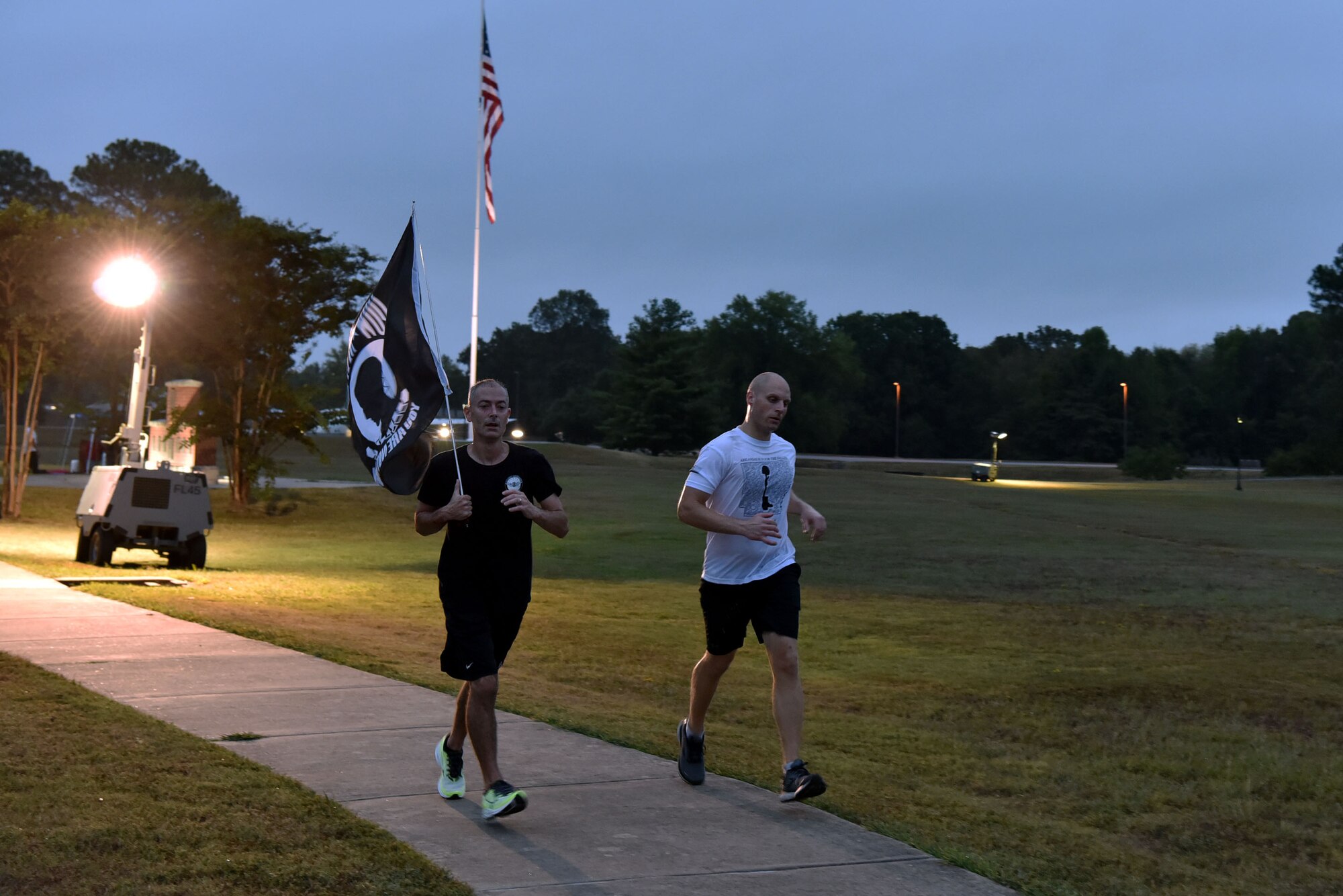 People run with a flag