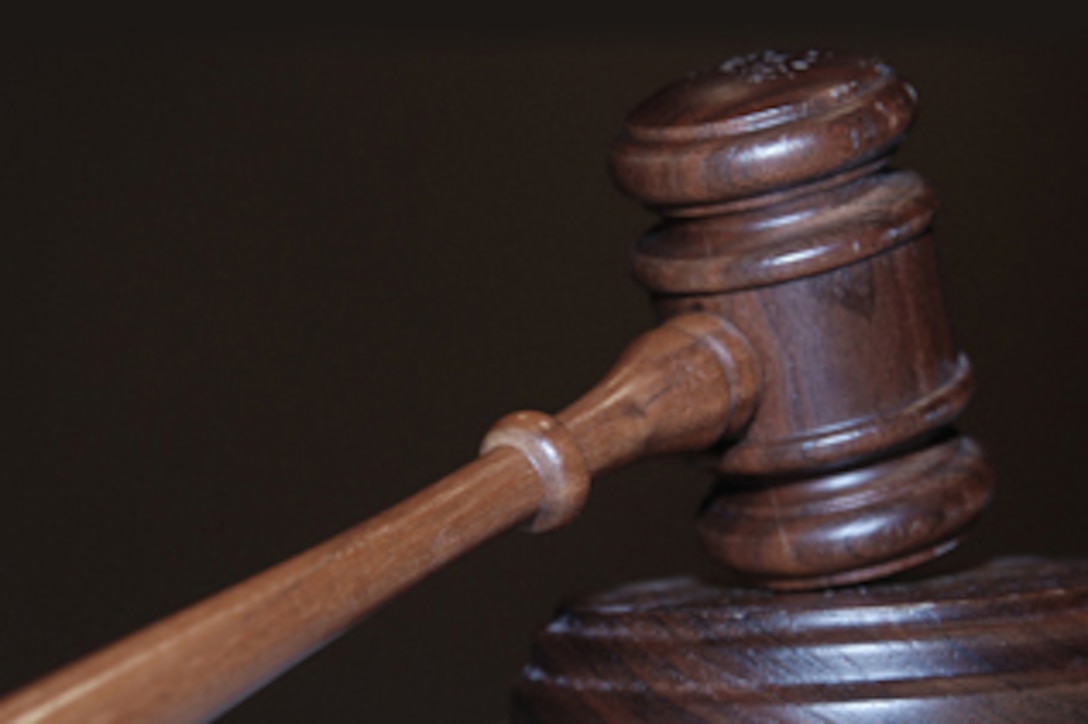 Photograph of a gavel and coaster.