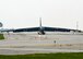 A B-52 taxis on the runway as it returns from Qatar from deployment