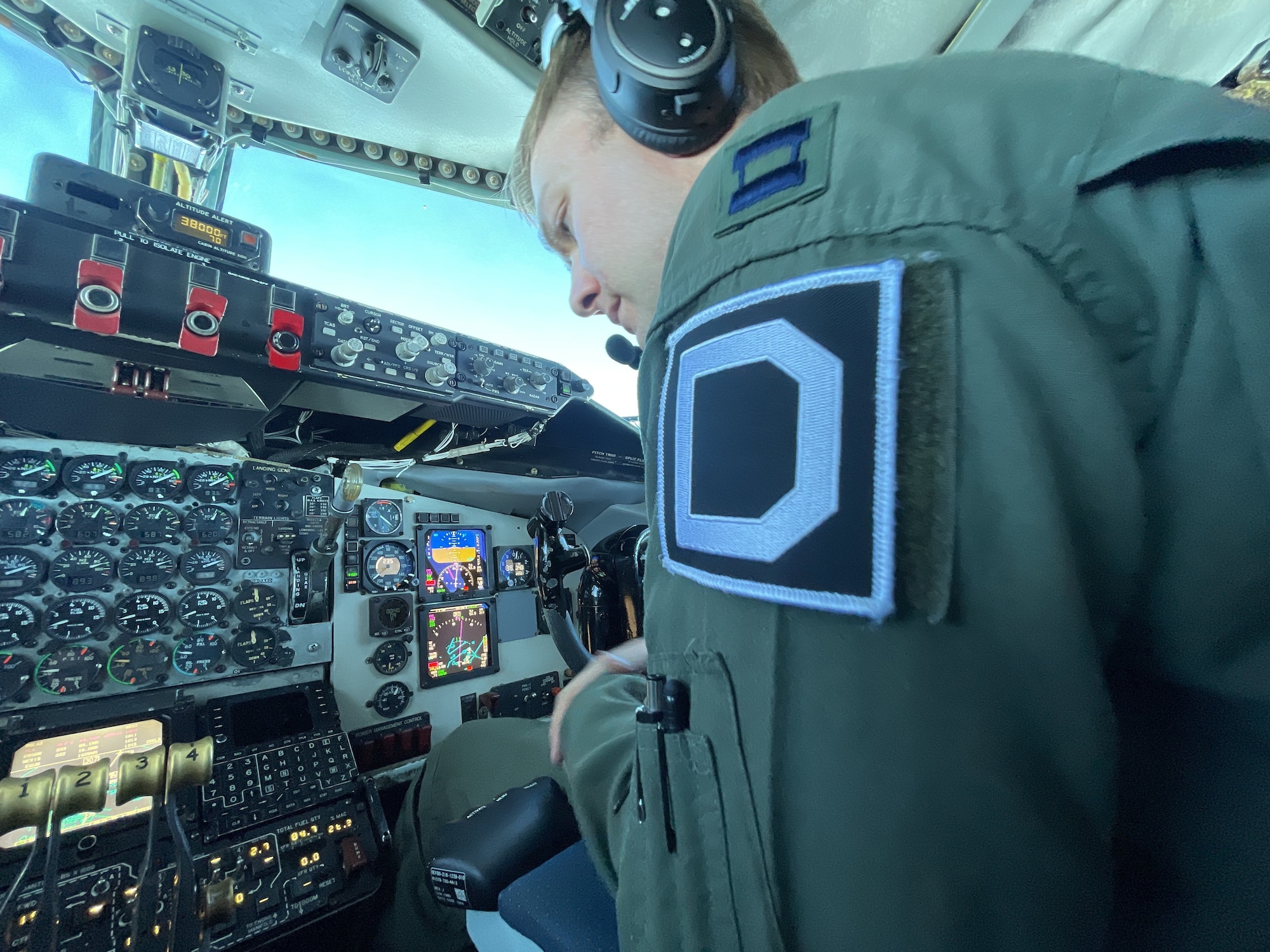 U.S. Air Force Capt. James Winegardner, 351st Air Refueling Squadron pilot, checks his flight instruments on board a KC-135 Stratotanker aircraft during a bomber task force mission over Europe, Sept. 8, 2021. The U.S. routinely and visibly demonstrates commitment to allies and partners through the global employment of its military force. (U.S. Air Force photo by Senior Airman Joseph Barron)