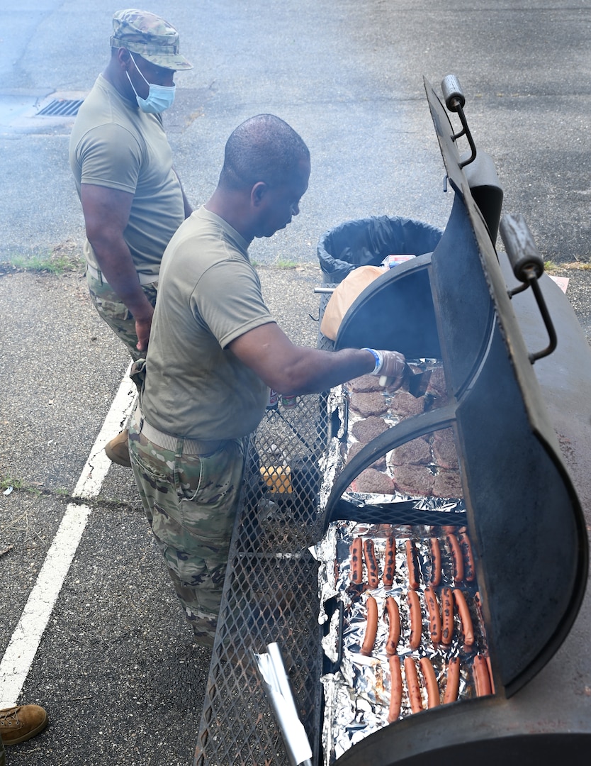 members grilling food