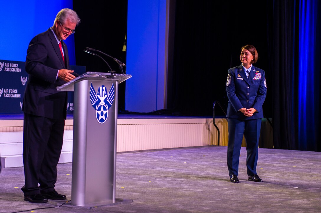 Gerald Murray, Air Force Association chairman and the 14th Chief Master Sgt. of the Air Force speaks with Chief Master Sgt. of the Air Force JoAnne S. Bass