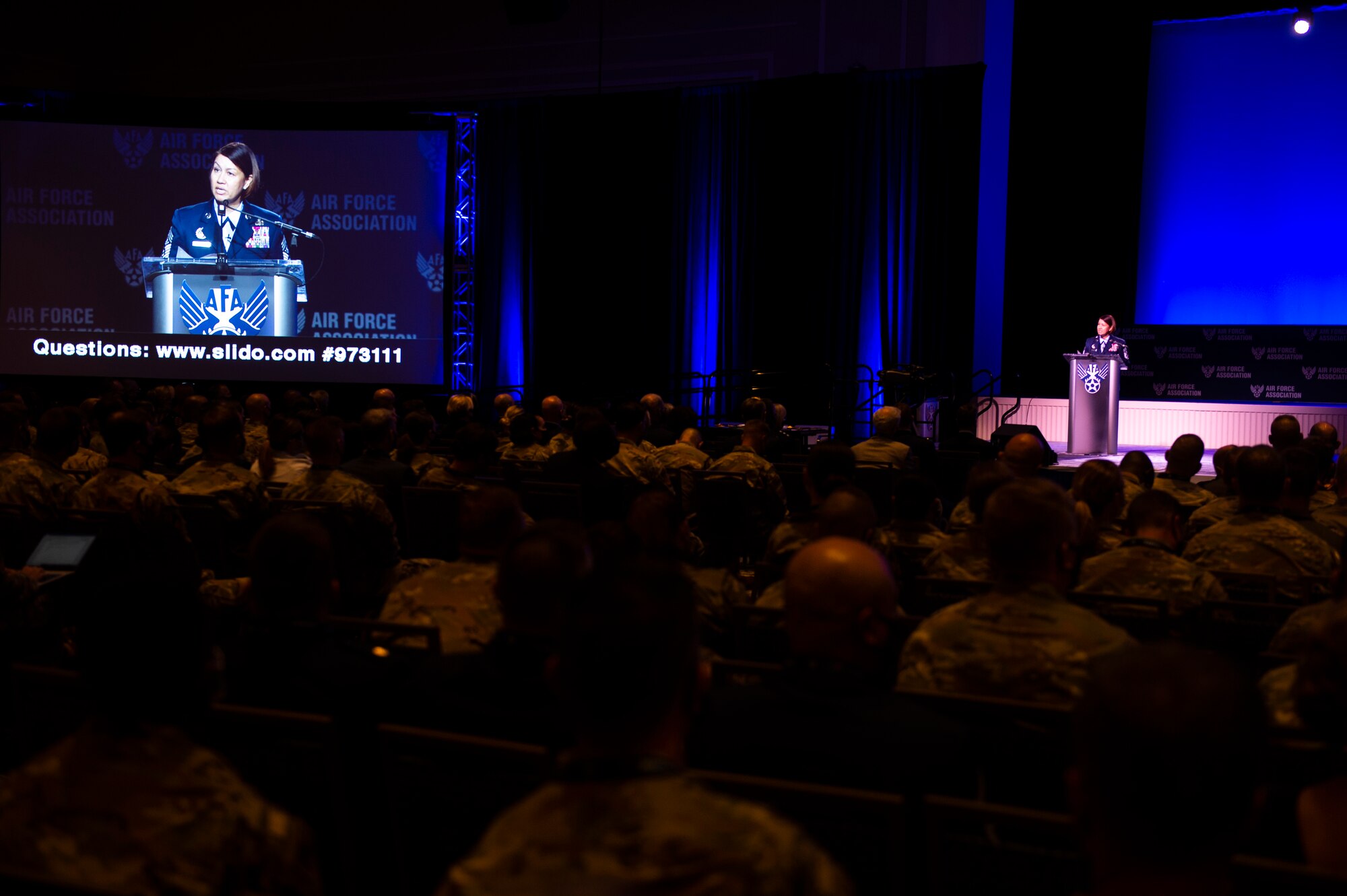 Chief Master Sgt. of the Air Force JoAnne S. Bass delivers remarks and recognizes the 12 Outstanding Airmen of the Year during the 2021 Air Force Association Air, Space and Cyber Conference in National Harbor, Md., Sept. 20, 2021.