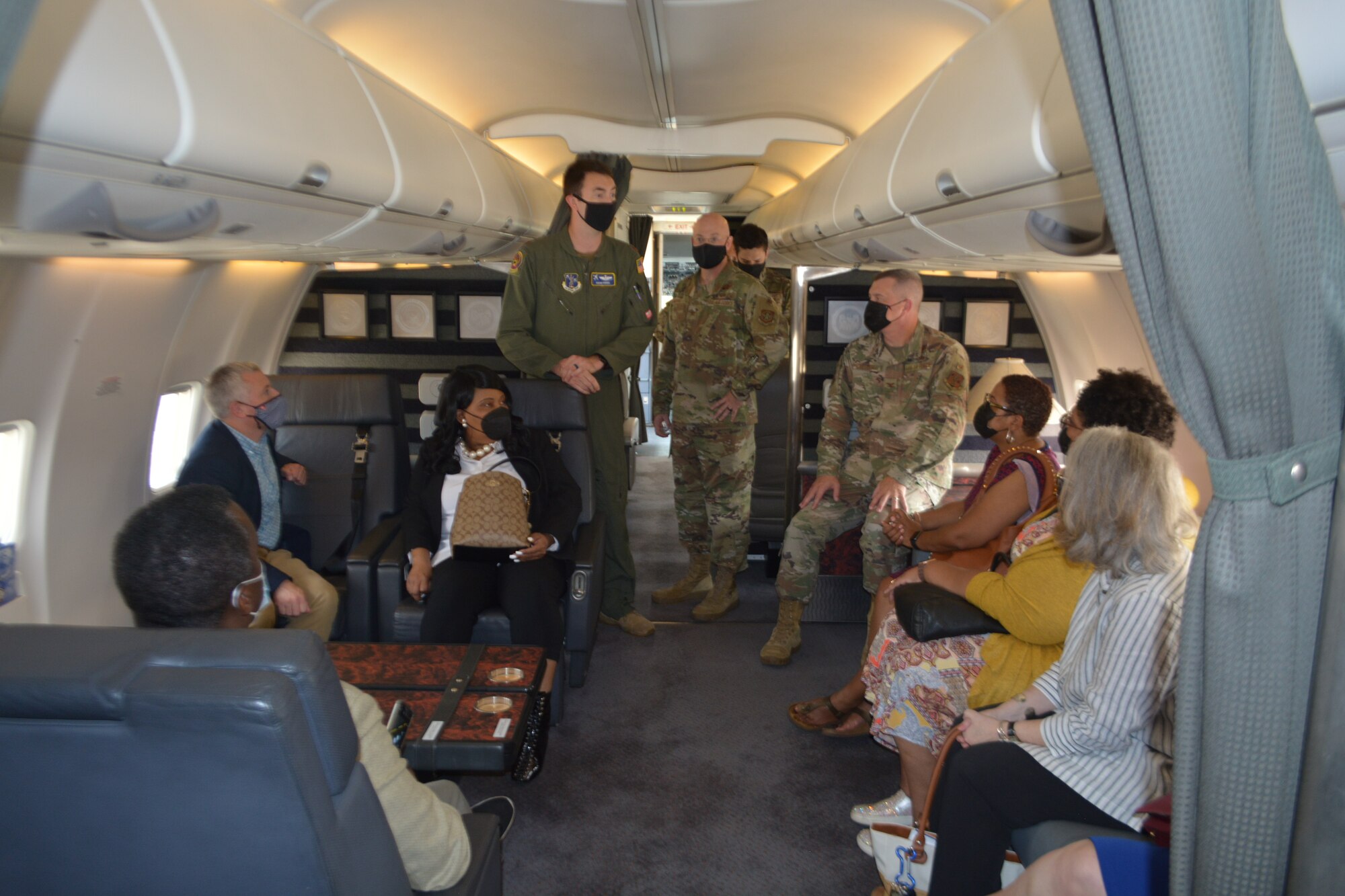 Col. Michael Oliver, 113th Wing, District of Columbia Air National Guard vice commander, along with aircrew members from the 201st Airlift Squadron, answer questions from the JBA honorary commanders as they began their tour of a C-40 during the Honorary Commanders Program quarterly visit at JBA, Md., Sept. 14, 2021.