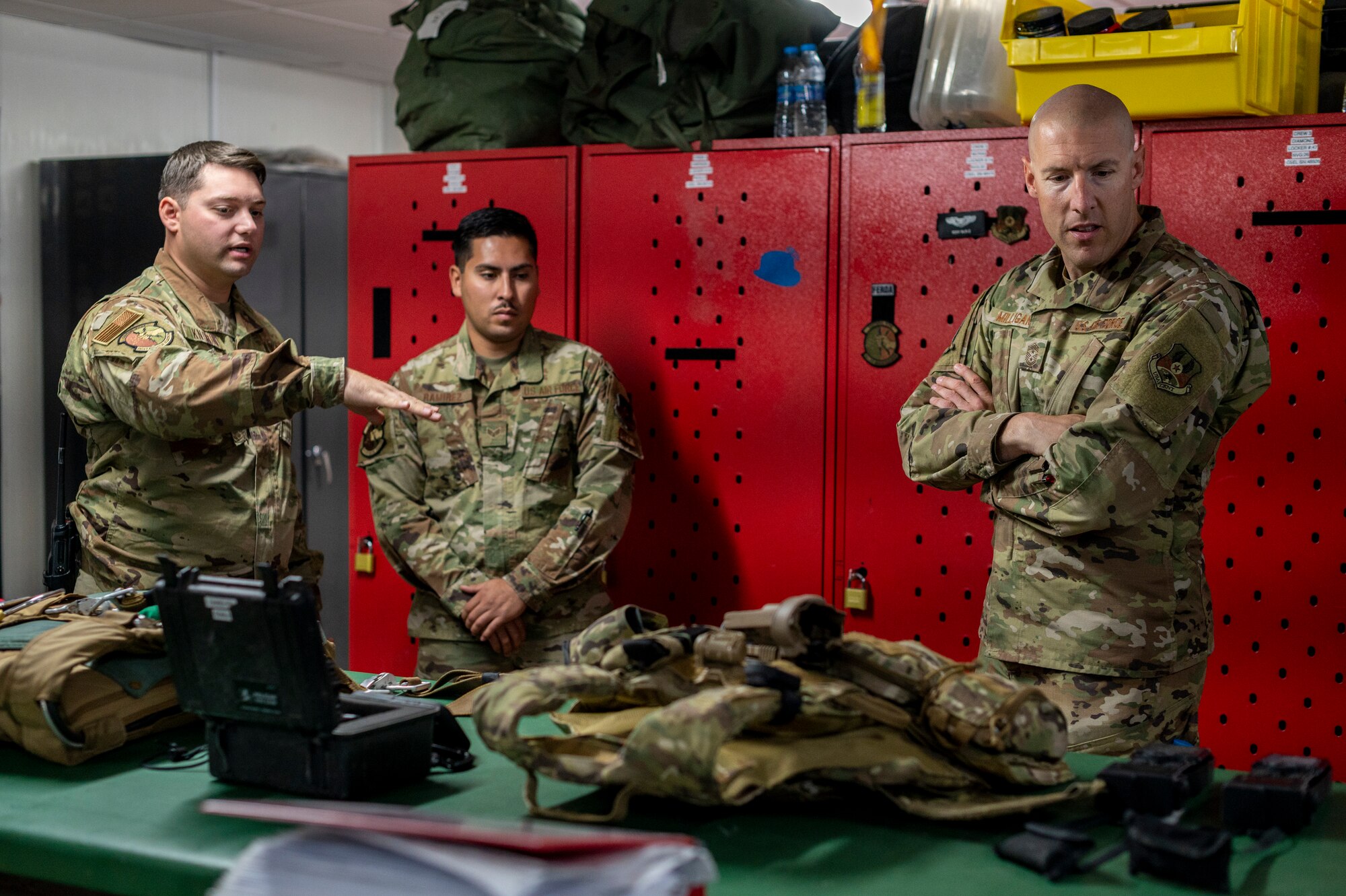 U.S. Air Force Chief Master Sgt. Sean Milligan, 332nd Air Expeditionary Wing command chief, meets with Airmen from the 26th Expeditionary Rescue Squadron Sept. 18, 2021, at an undisclosed location somewhere in Southwest Asia.