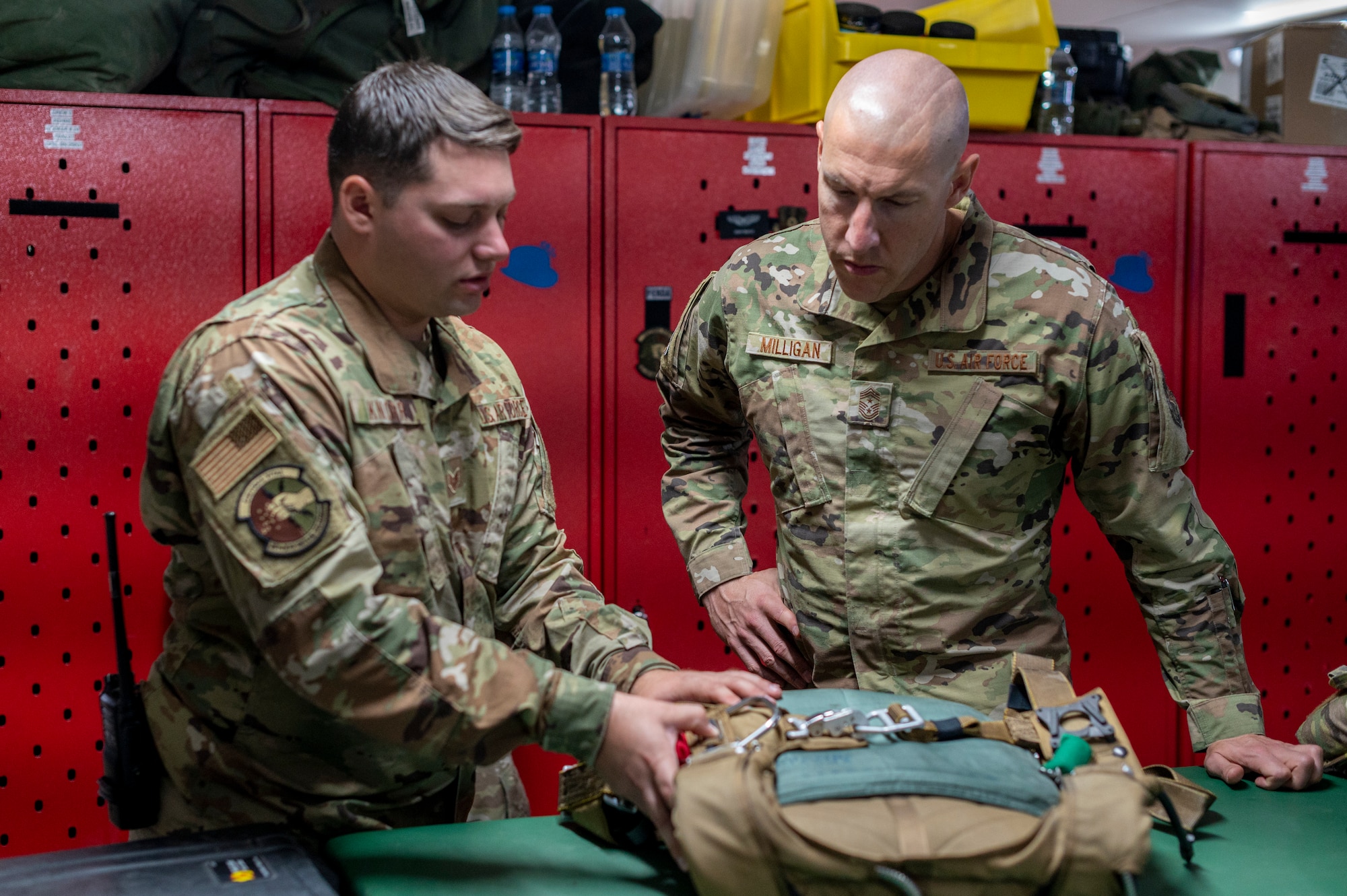 U.S. Air Force Chief Master Sgt. Sean Milligan, 332nd Air Expeditionary Wing command chief, meets with Airmen from the 26th Expeditionary Rescue Squadron Sept. 18, 2021, at an undisclosed location somewhere in Southwest Asia.