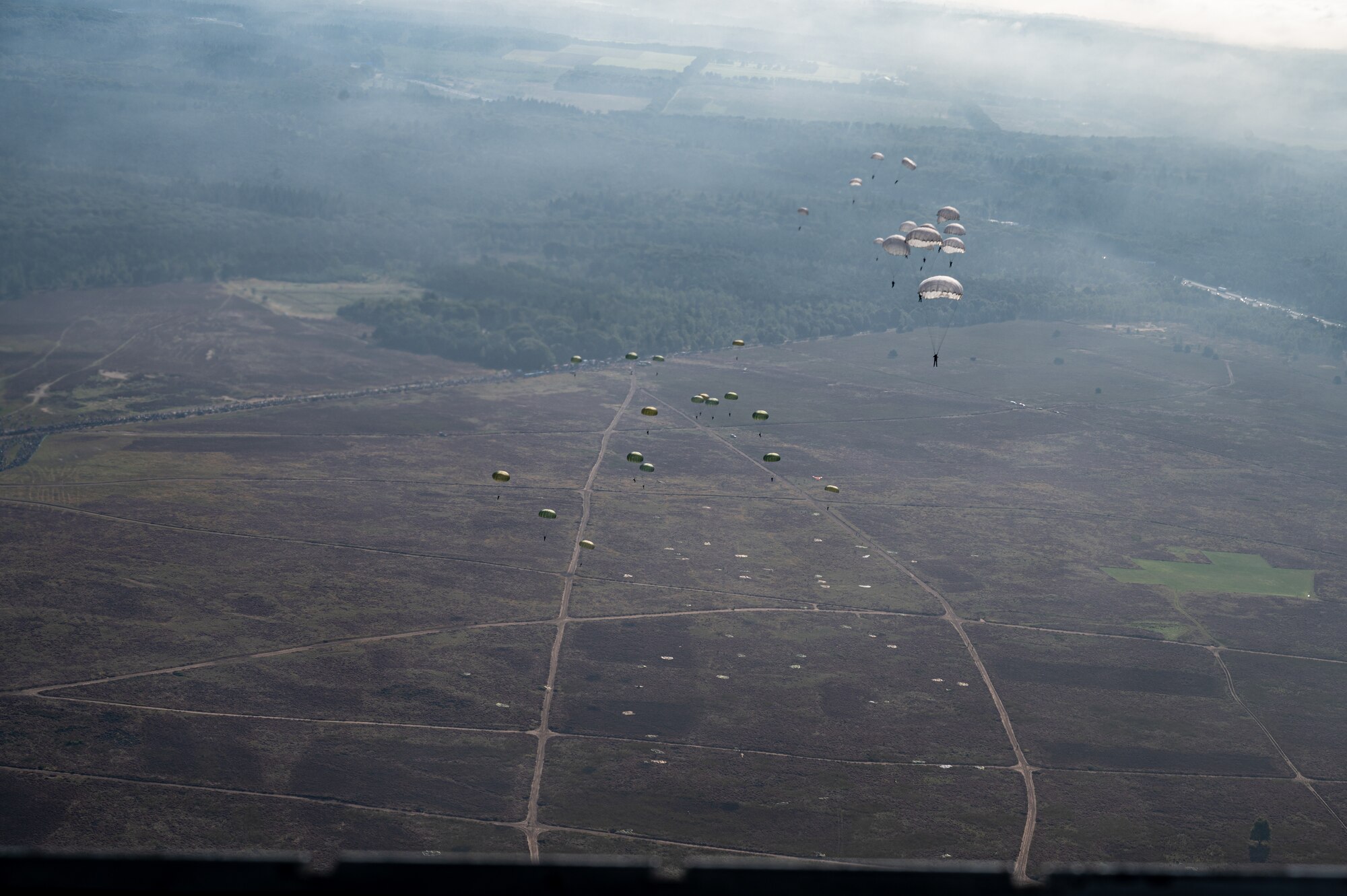 U.S. Airmen jump alongside NATO partners during Falcon Leap 21