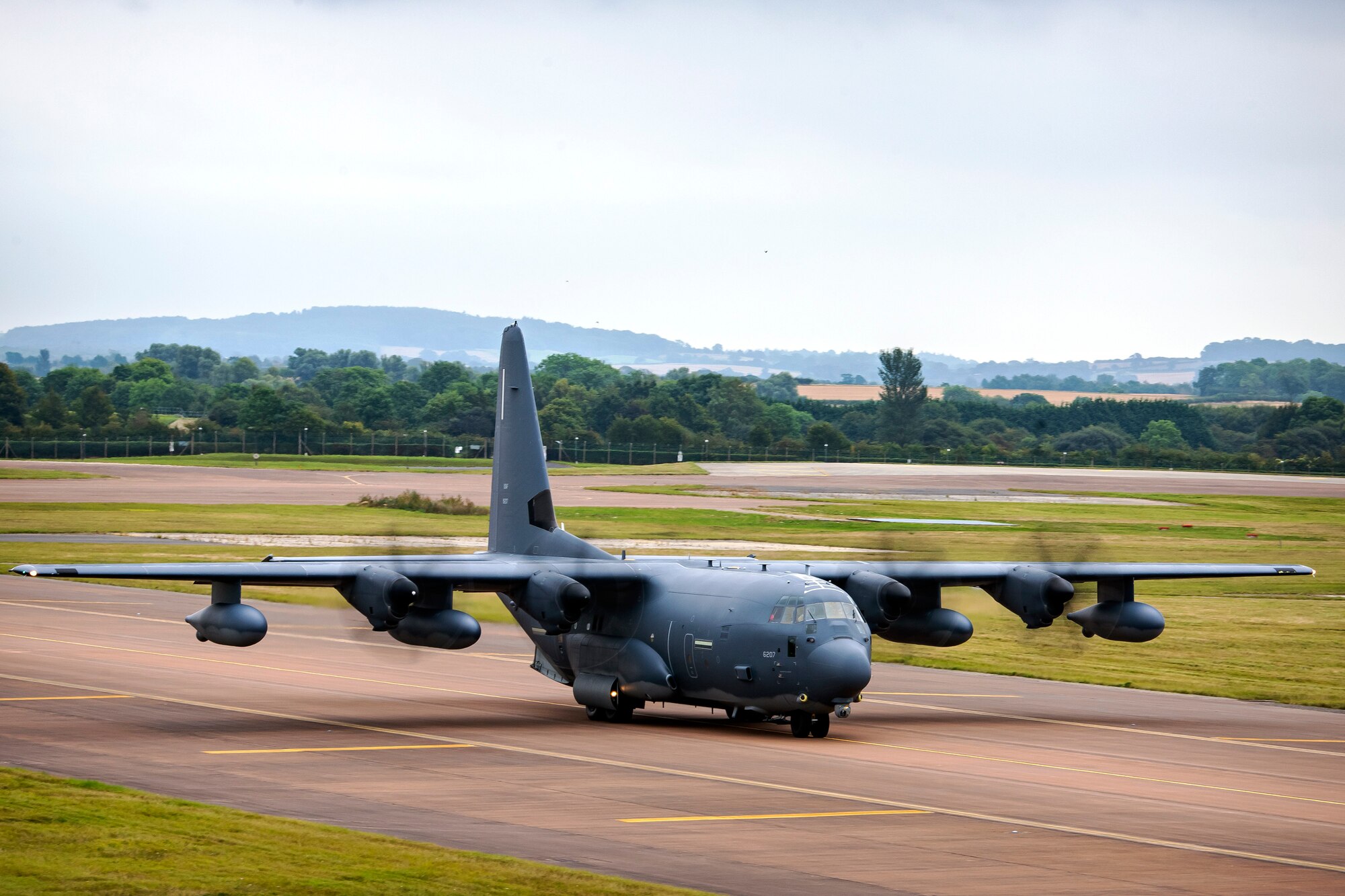An MC-130J Commando II assigned to the 352d Special Operations Wing lands during an Agile Combat Employment exercise at RAF Fairford, England, Sept. 13, 2021. Airmen from the 501st Combat Support Wing, 100th Air Refueling Wing and 352d SOW partnered for an ACE exercise to test their overall readiness and lethality capabilities. ACE enables U.S. forces in Europe to operate from locations with varying levels of capacity and support. (U.S. Air Force photo by Senior Airman Eugene Oliver)