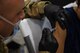 An Airman attached to Task Force-Holloman administers a vaccination to an Afghan evacuee in support of Operation Allies Welcome on Holloman Air Force Base, New Mexico, Sept. 20, 2021. The Department of Defense, through U.S. Northern Command, and in support of the Department of State and Department of Homeland Security, is providing transportation, temporary housing, medical screening, and general support for at least 50,000 Afghan evacuees at suitable facilities, in permanent or temporary structures, as quickly as possible. This initiative provides Afghan evacuees essential support at secure locations outside Afghanistan. (U.S. Army photo by Pfc. Anthony Sanchez)