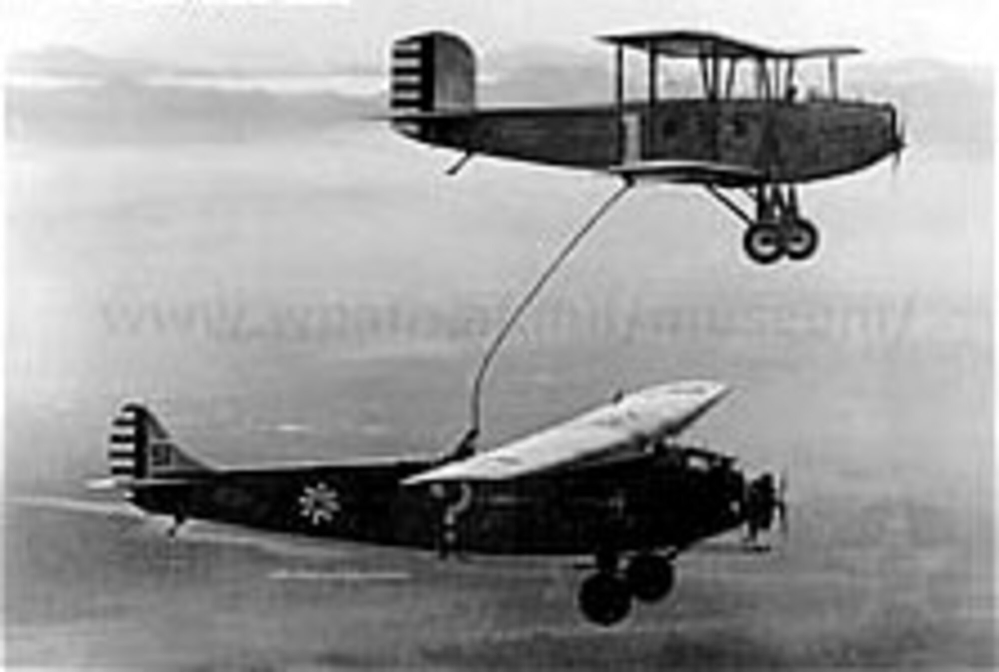 Question Mark (below) and Douglas C-1 Refueling biplane, January 1929. (Courtesy Photo)
