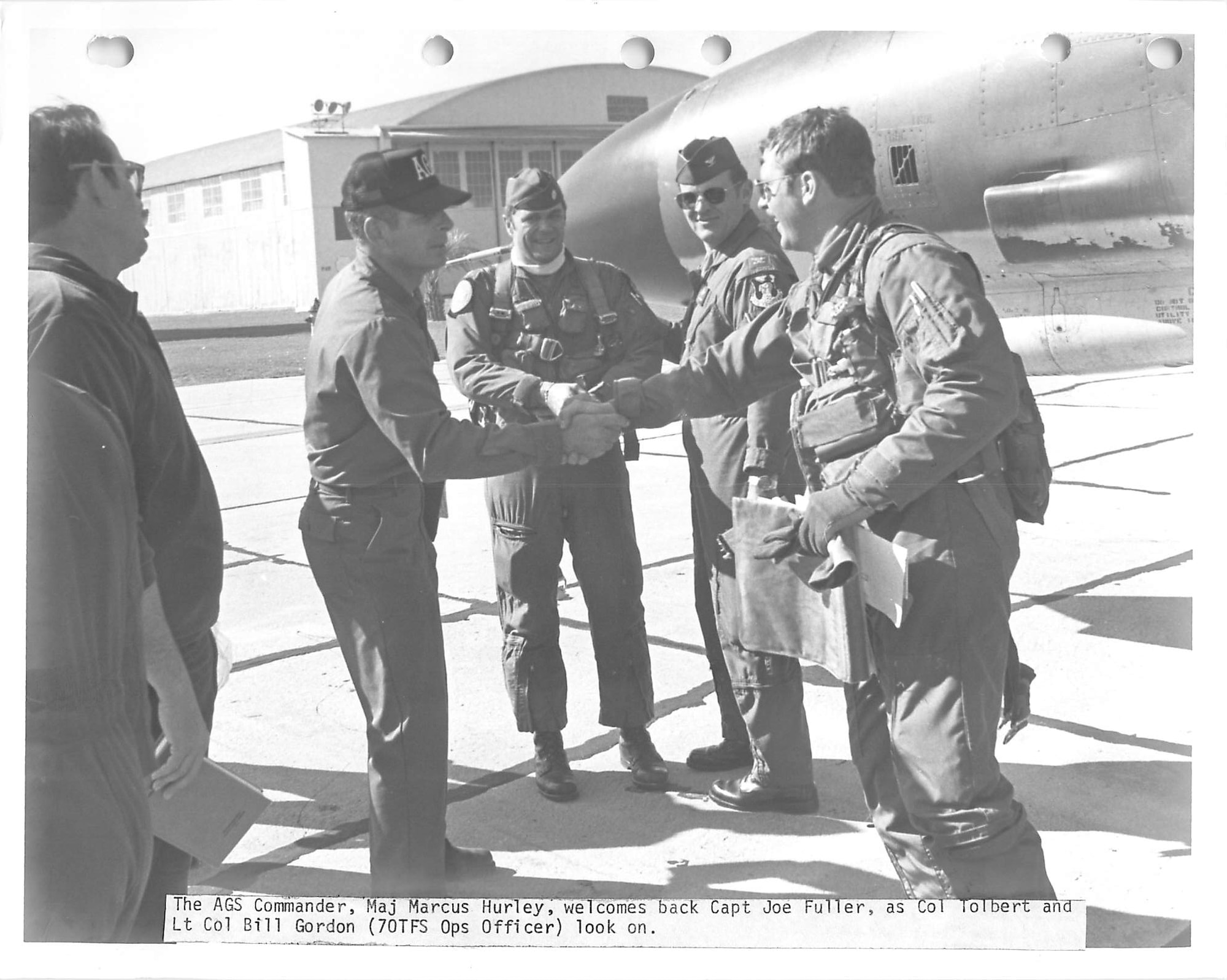 Airman greets another Airman