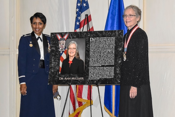 Col. Jenise Carroll, 75th Air Base Wing commander, poses with Dr. Ann Millner after receiving the prestigious Community Wingman Award at the Hill Aerospace Museum