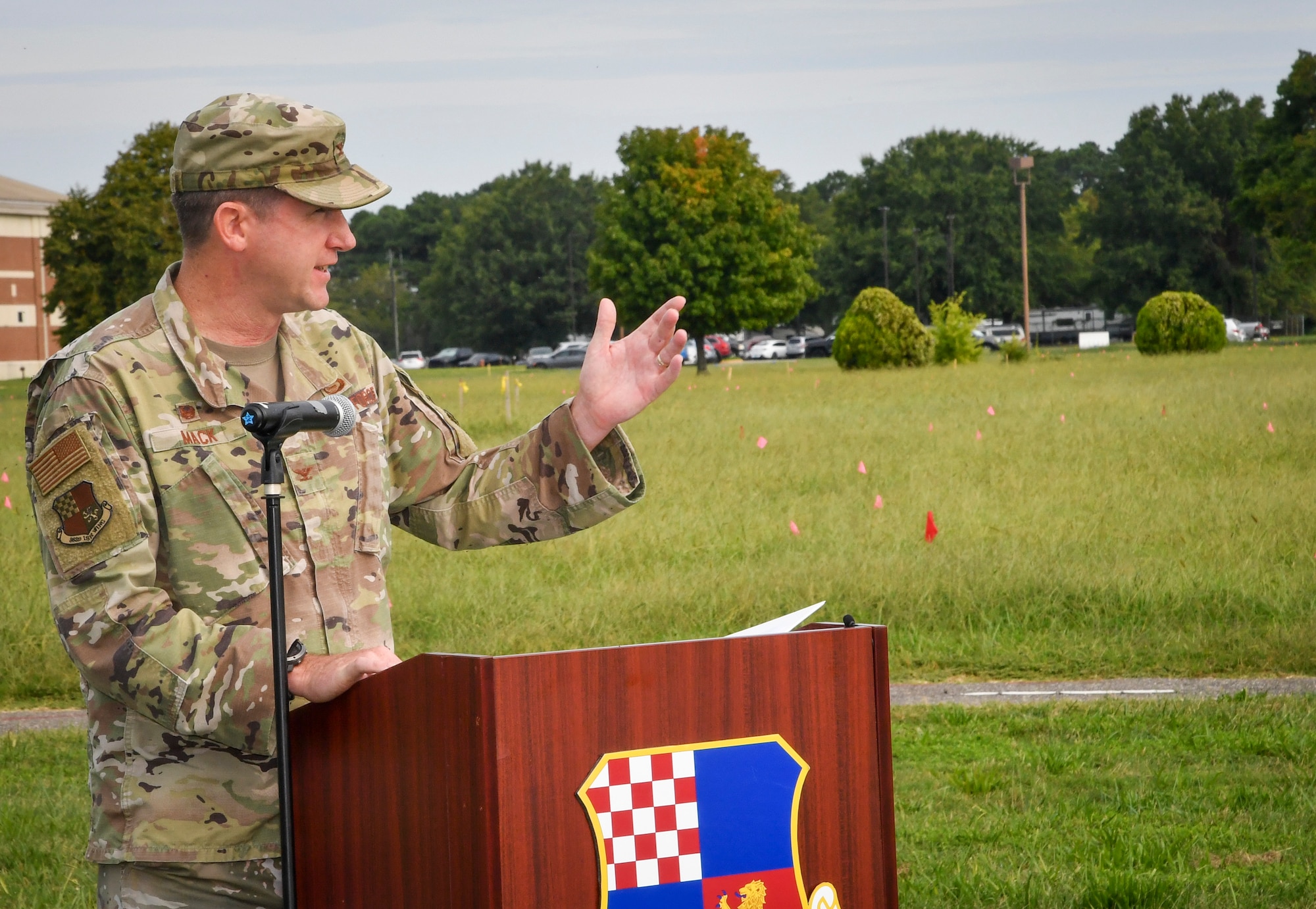 Individual speaks behind a podium.