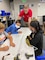 Garrison Myer offers technical and practical advice to students during the bridge building exercise following his presentation on Engineering at STARBASE Academy Winchester on Sept. 20, 2021.