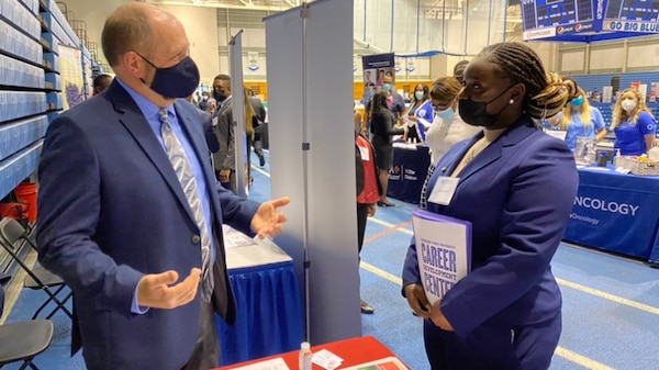 Chief of the Regulatory Division Todd Tillinger talks with TSU Senior KeAnna Dakwa about the career possibilities within USACE.