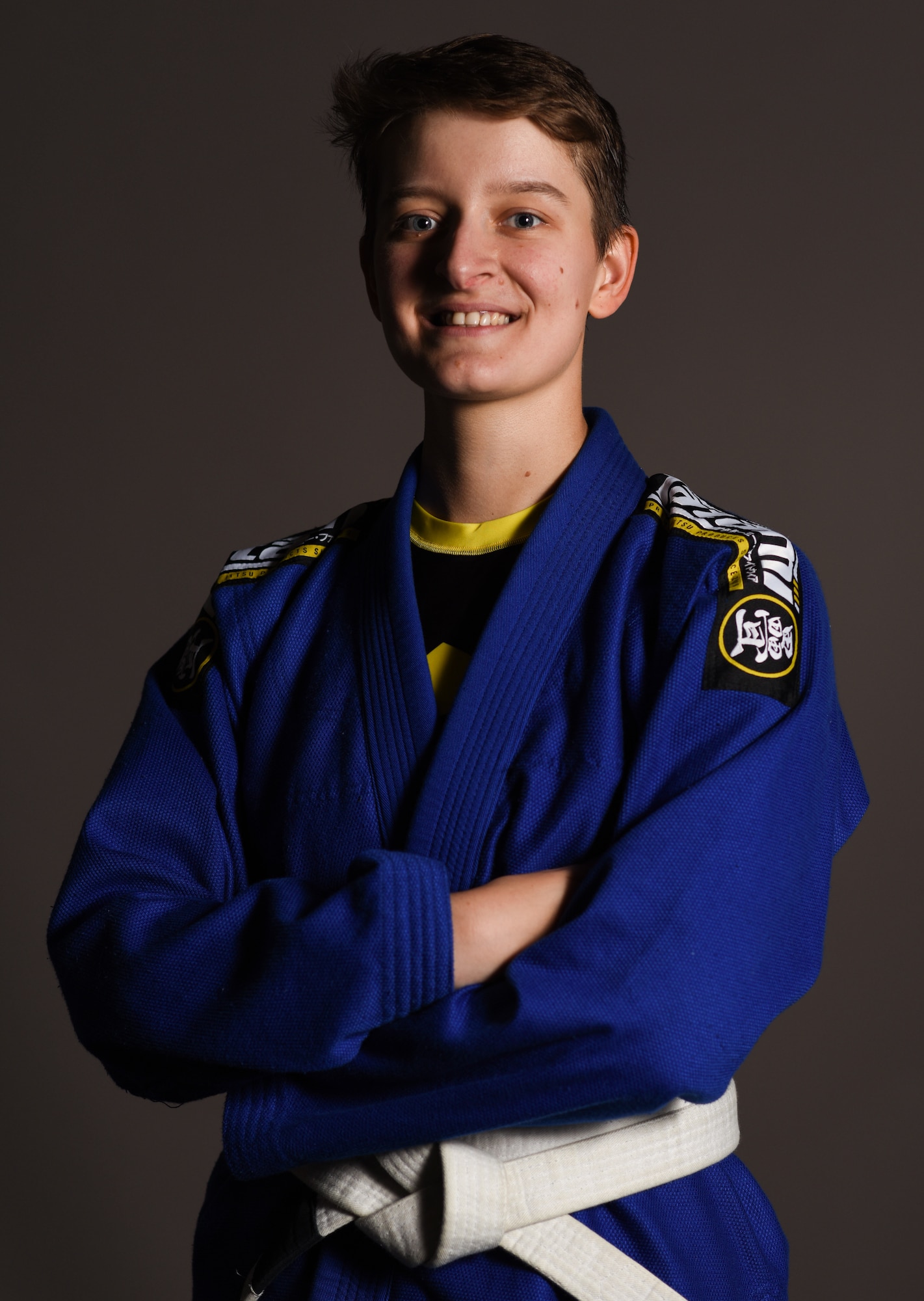 A1C Moskvichova poses for a photo while wearing her Jiu Jitsu Gi in a photo studio