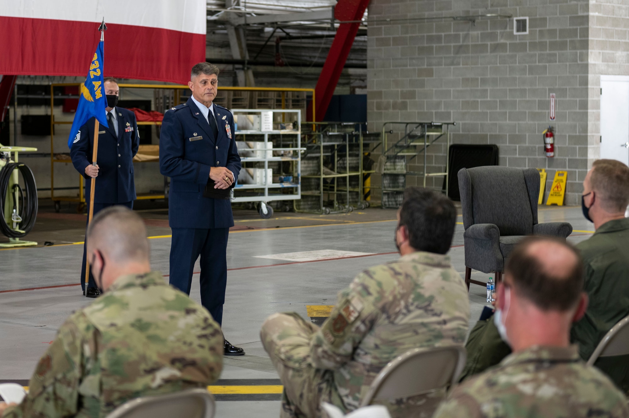 Col. Glenn Collins, 932nd Airlift Wing commander, speaks during the 932nd Operations Group assumption of command ceremony, Scott Air Force Base, Illinois, Sept. 11, 2021. Lt. Col. Daniel Davis, 932nd Airlift Wing, incoming Operations Group commander, joins the 932nd Ops Group from Tanker/Operations Support Airlift Requirements Office of the Air Force Reserve, Headquarters, where he served as the chief. (U.S. Air Force Photo by Staff Sgt. Brooke Spenner)