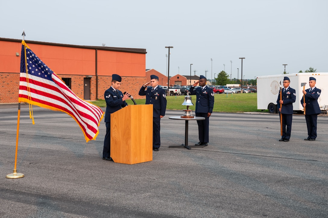 Members of the 932nd Civil Engineering Squadron, salute during a 9/11 remembrance ceremony, Scott Air Force Base, Illinois, Sept. 11, 2021. 932nd CES held a remembrance ceremony with the symbolic “Ringing of the Fire Department Bell”, to honor the fallen. (U.S. Air Force Photo by Staff Sgt. Brooke Spenner)