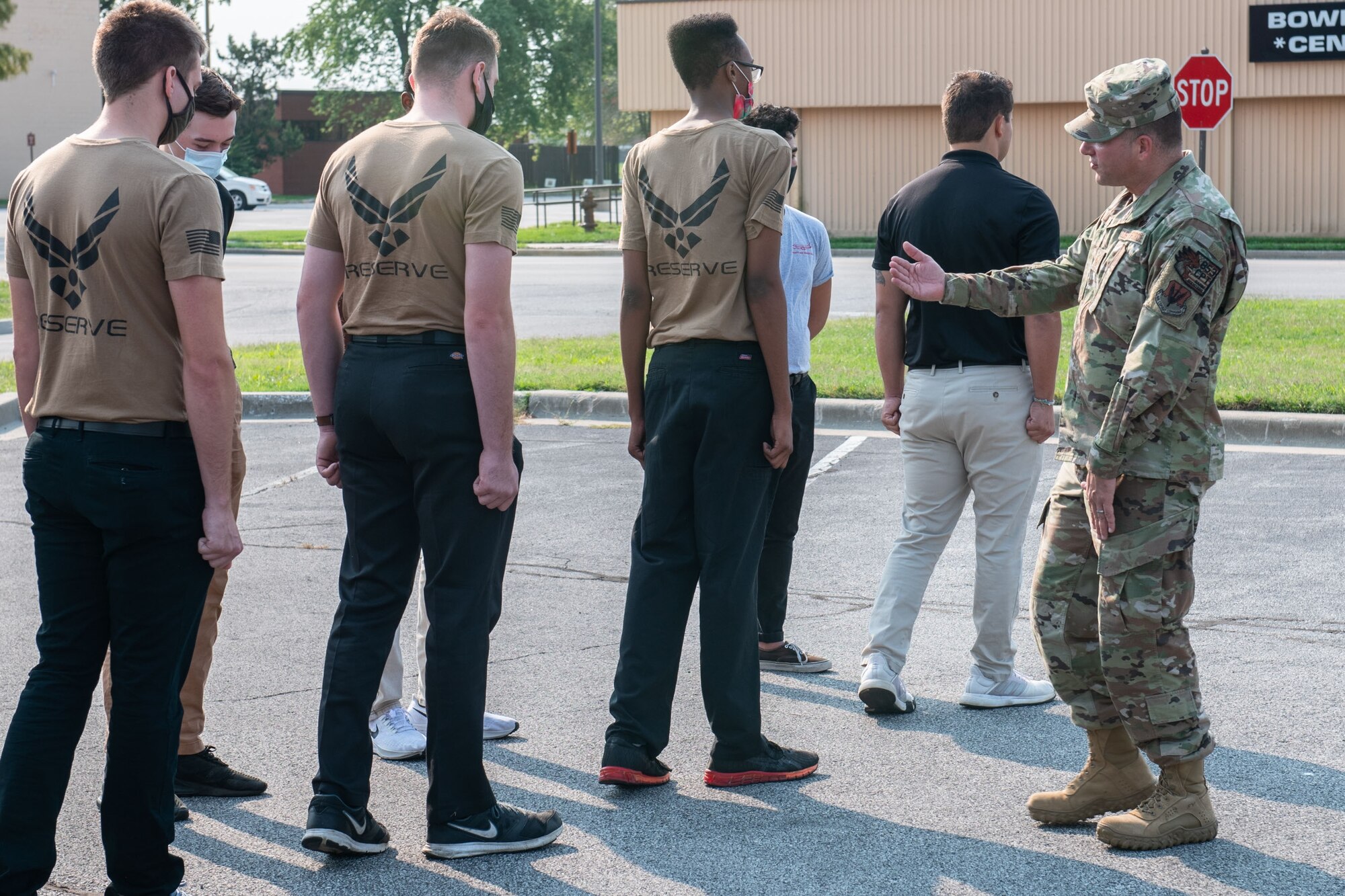 Master Sgt. Stravros Kalfogou, 375th Communications Support Squadron, previous training instructor, corrects a recruits drill movement, Scott Air Force Base, Illinois, Sept. 12, 2021. The D&TF teaches recruits knowledge learned in the first training week of basic military training (BMT), to help prepare and build confidence of recruits before they attend BMT. (U.S. Air Force Photo by Staff Sgt. Brooke Spenner)