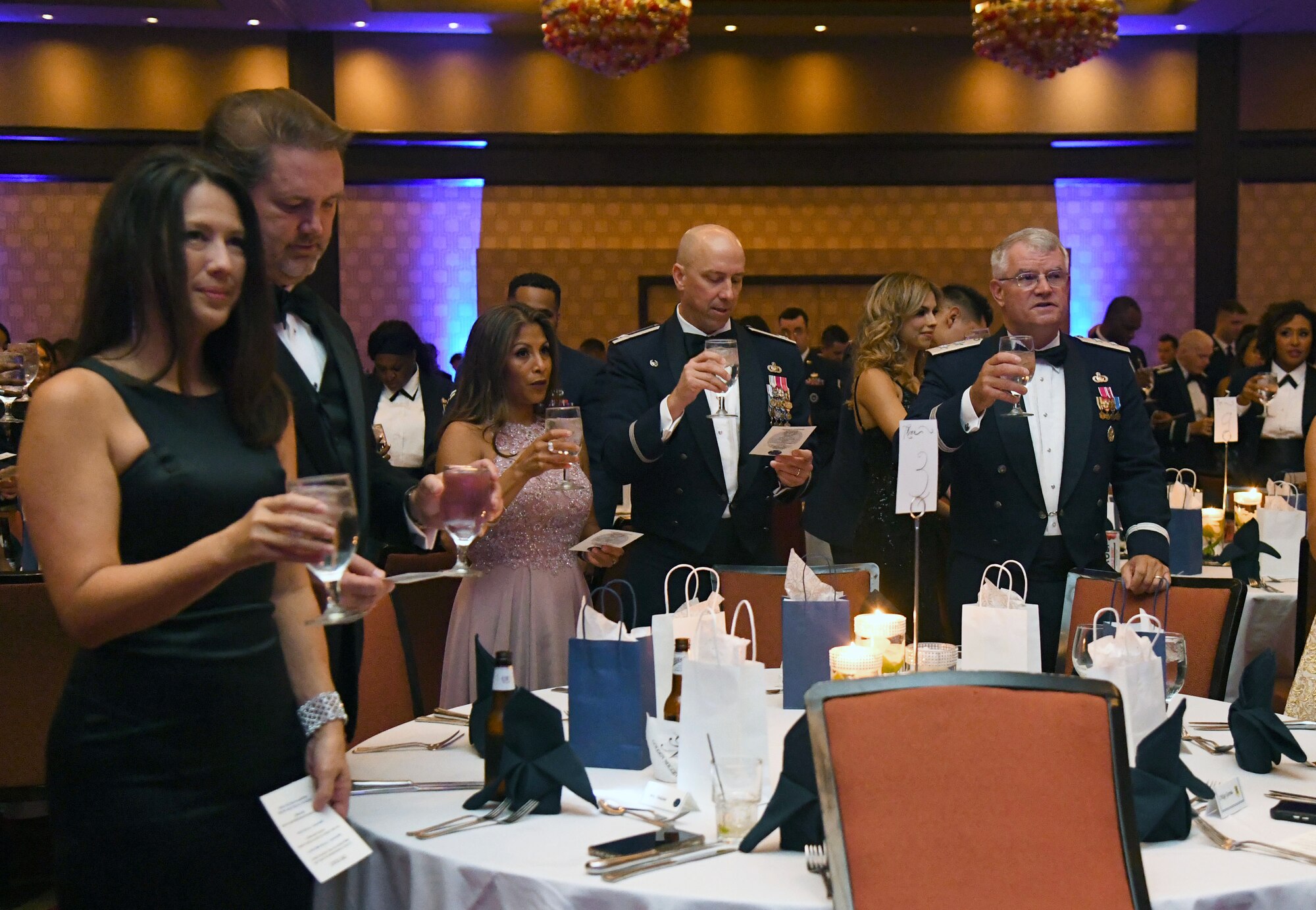 Keesler personnel participate in a toasting ceremony during the Keesler Air Force Ball inside the Golden Nugget Casino, Biloxi, Mississippi, Sept. 18, 2021. The event, which celebrated the Air Force�s 74th birthday, also included a cake cutting ceremony. (U.S. Air Force photo by Kemberly Groue)