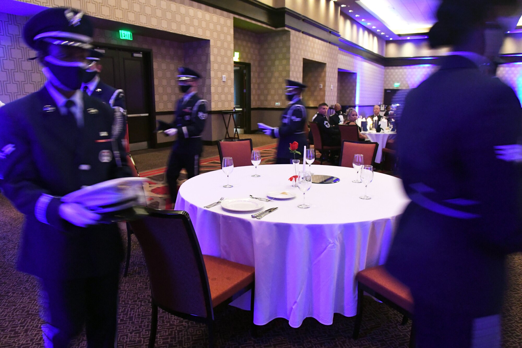 Members of the Keesler Air Force Base Honor Guard perform a POW/MIA table ceremony during the Keesler Air Force Ball inside the Golden Nugget Casino, Biloxi, Mississippi, Sept. 18, 2021. The event, which celebrated the Air Force�s 74th birthday, also included a cake cutting ceremony. (U.S. Air Force photo by Kemberly Groue)