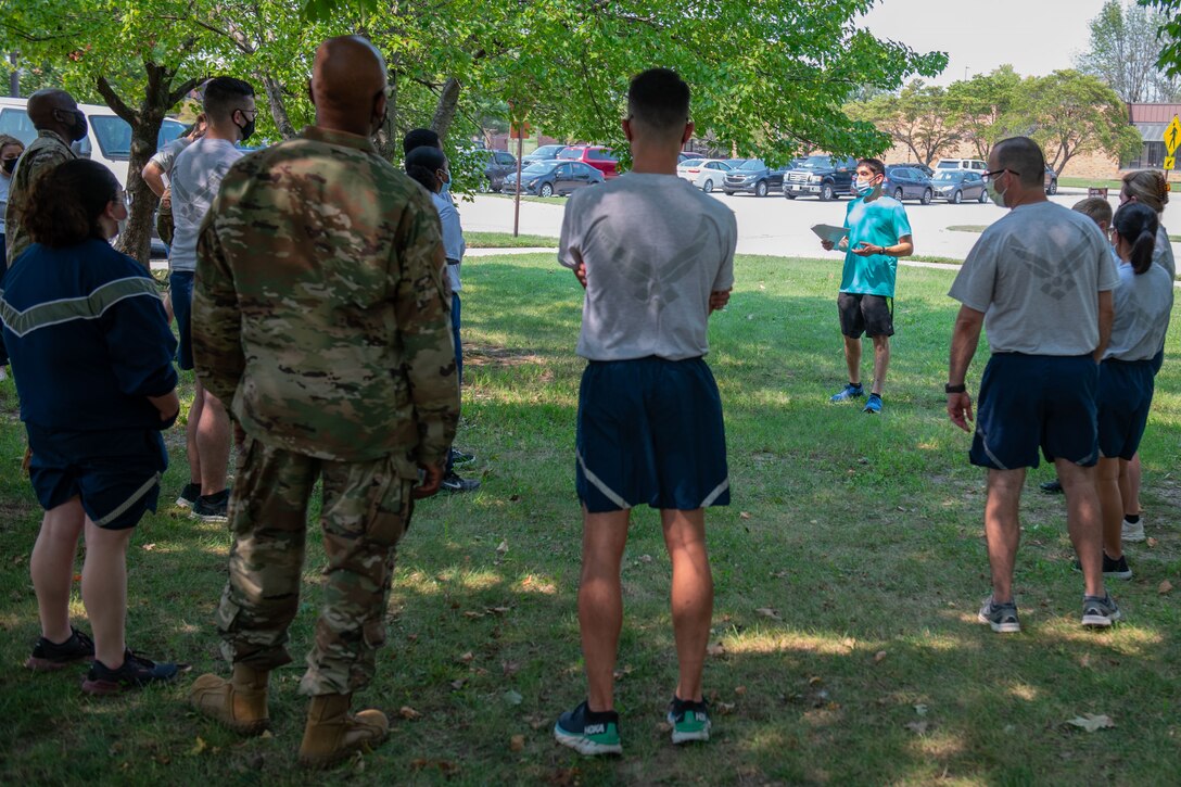 Members of the 932nd Medical Group participate in the fit to fight activity during their annual sexual assault prevention and response/suicide prevention training, Scott Air Force Base, Illinois, Sept. 12, 2021. Each activity reviewed the training material, for example during the fit to fight activity a team of airman would be asked a training question and if answered correctly all other groups would do an exercise. (U.S. Air Force Photo by Staff Sgt. Brooke Spenner)