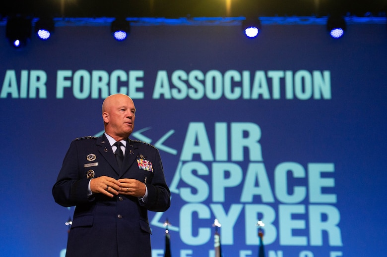 Chief of Space Force Operations Gen. John W. “Jay” Raymond gives an update on the U.S. Space Force during the Air Force Association Air, Space and Cyber Conference at National Harbor, Md., Sept. 21, 2021. During his presentation, Raymond previewed the Space Force’s Service Dress Prototype and gave insight to the “Guardian Ideals,” which identifies the Space Force’s vision for its culture to ensure mission success. (U.S. Air Force photo by Tech. Sgt. Areca T. Wilson)