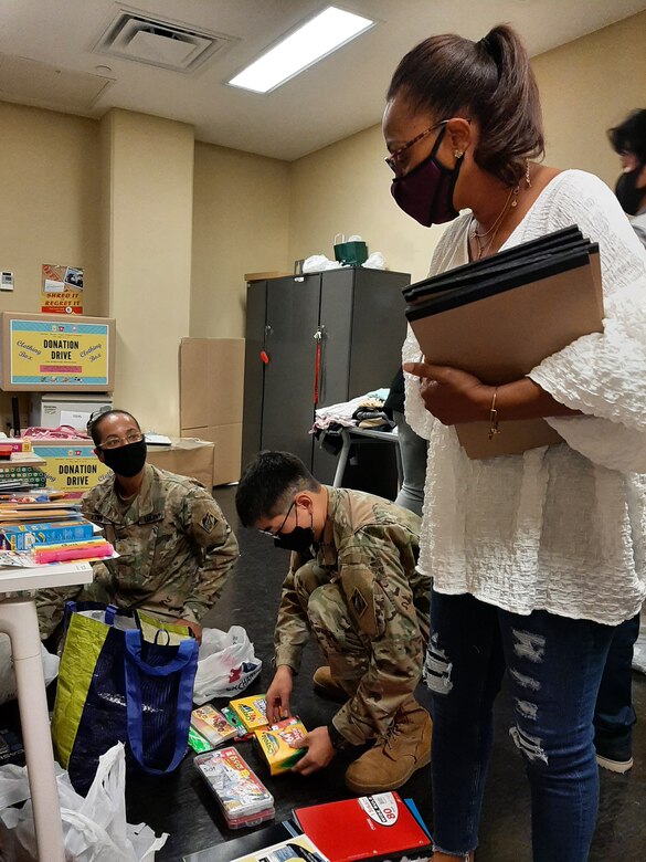 Volunteers from within the U.S. Army Corps of Engineers Far East District organize donation items that were collected from throughout the workforce during FED’s first Sungyook Orphanage donation drive at District headquarters, Sept. 10. The District collected 675 items, to include clothes, books, toys, makeup, accessories, school supplies and more, and delivered the gifts to the orphanage, Sept. 13, in time for the Chuseok holiday.