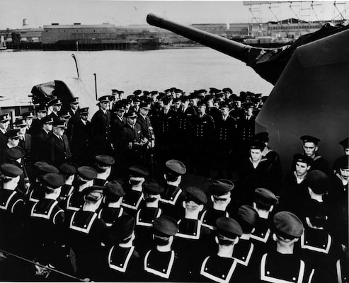 LCDR Ernest Evans, USN Description: (1908-1944) At the commissioning ceremonies of USS Johnston (DD-557), Seattle, Washington, 27 October 1943. He was Johnston's Commanding Officer from then until she was sunk in the Battle off Samar, 25 October 1944, and was lost with the ship. U.S. Naval History and Heritage Command Photograph.