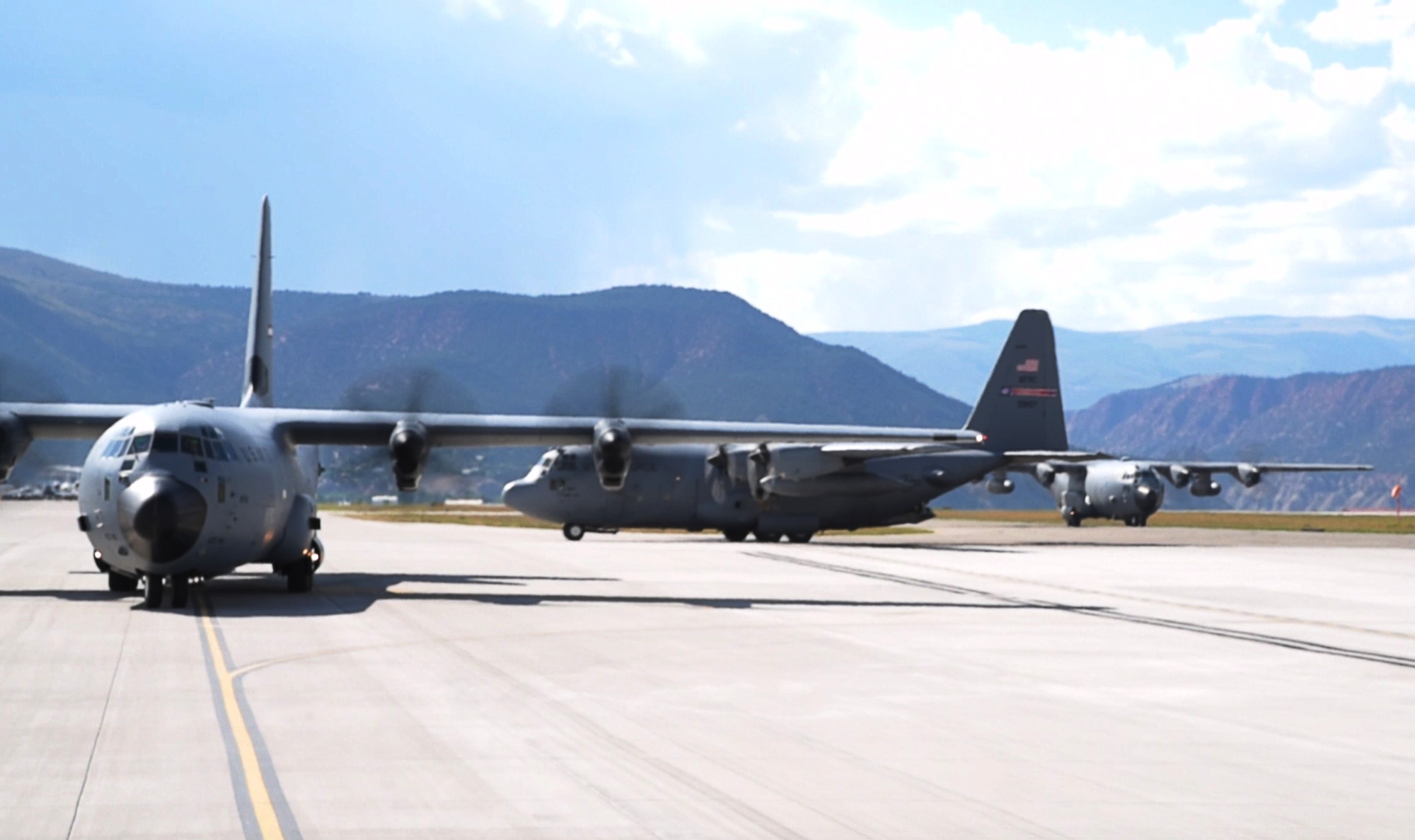 Members of the 815th Airlift Squadron out of Keesler Air Force Base, Miss. and the 757th Airlift Squadron out of Youngstown Air Reserve Station, Ohio taxi after landing in formation at the Vail Valley Jet Center, Gypsum, Colorado after conducting an airdrop in Taylor Park, Colorado during the 22nd Air Force’s flagship exercise Rally in the Rockies Sept. 13-17, 2021. The exercise is designed to develop Airmen for combat operations by challenging them with realistic scenarios that support a full spectrum of operations during military actions, operations or hostile environments. (U.S. Air Force photo by Master Sgt. Jessica Kendziorek)