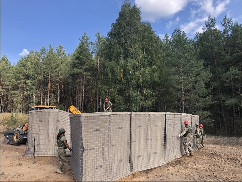 Soldiers of the 55th Maneuver Enhancement Brigade and Airmen from the 201st RED HORSE conduct joint subject matter engagements on engineering tasks during Exercise ENGINEER THUNDER Sept. 6-17 at the Pabradė Training Area in Lithuania. Lithuanian Land Forces Commander, Brig. Gen. Raimundas Vaiksnoras visited the Pennsylvania National Guardsmen who worked hand-in-hand with multiple NATO countries to include: Lithuania, Estonia, United Kingdom, Germany, Netherlands, and Latvia.