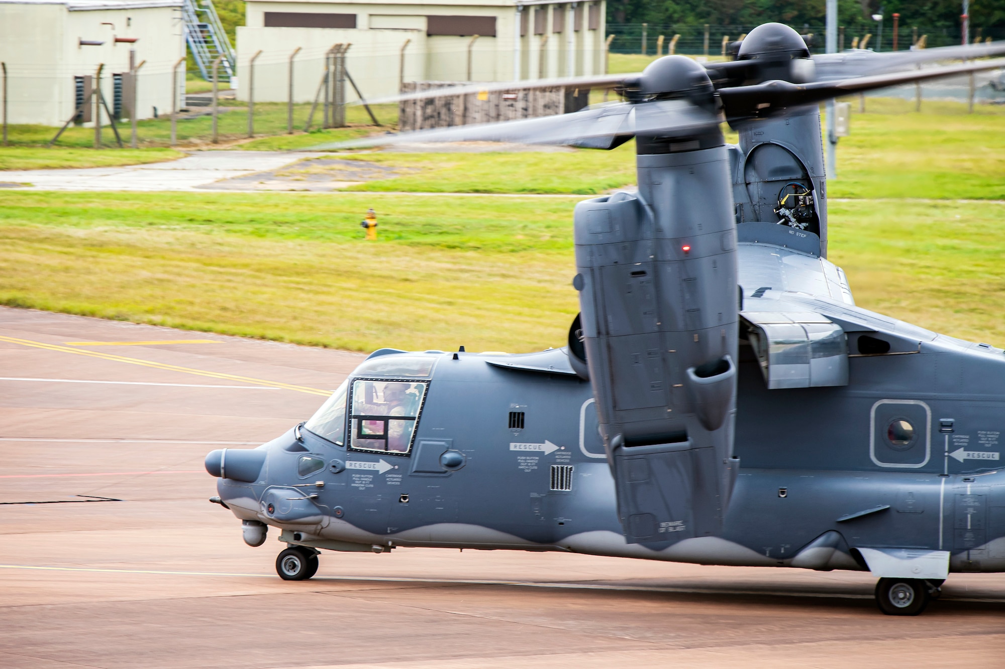 A CV-22A Osprey assigned to the 352d Special Operations Wing taxis on the flightline during an Agile Combat Employment exercise at RAF Fairford, England, Sept. 13, 2021. Airmen from the 501st Combat Support Wing, 100th Air Refueling Wing and 352d SOW partnered to conduct an ACE exercise to test their overall readiness and lethality capabilities. This further ensures Airmen and aircrews are postured to deliver lethal combat power across the full spectrum of military operations. (U.S. Air Force photo by Senior Airman Eugene Oliver)