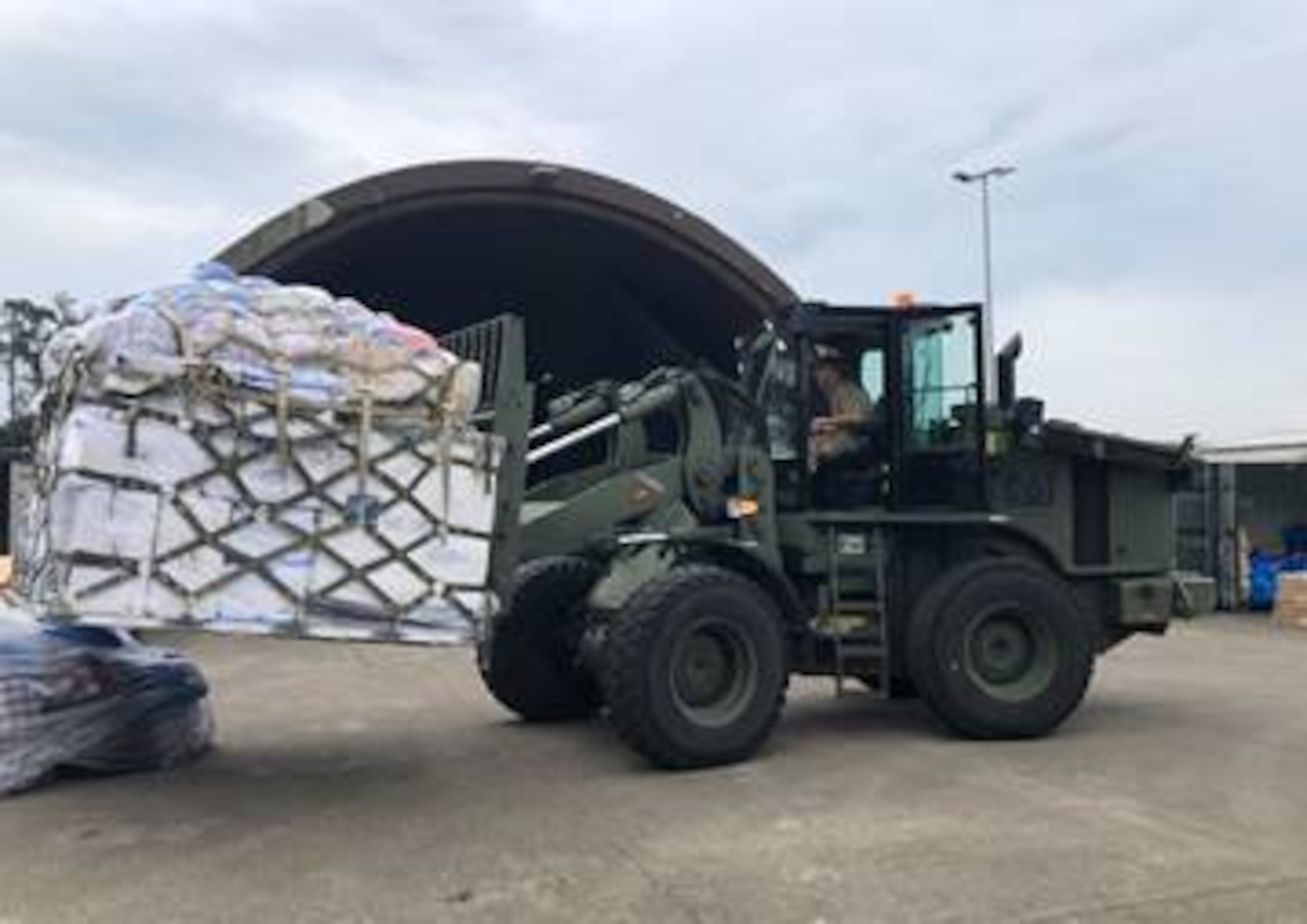 Forklift carrying donations.