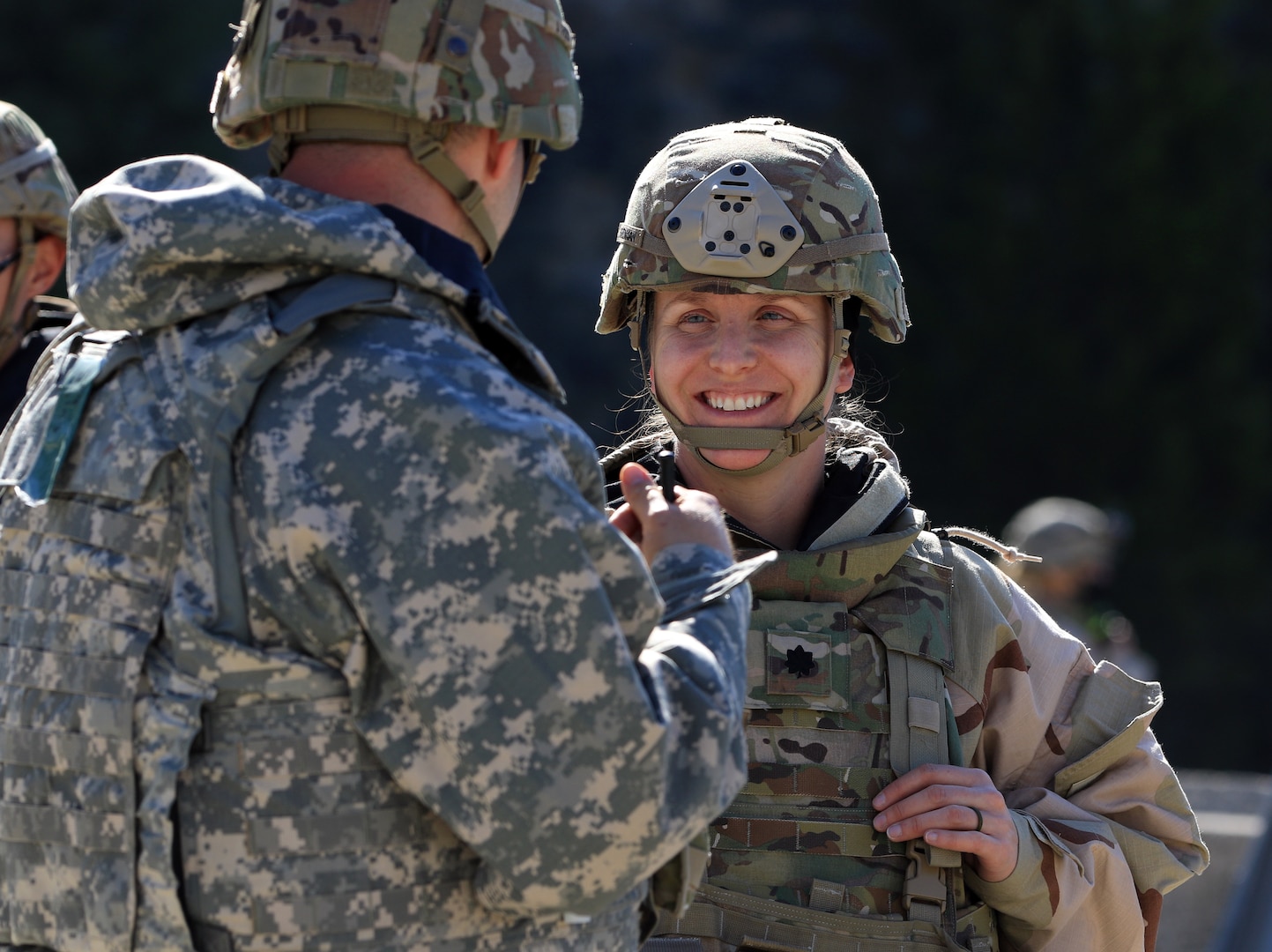 Two service members talking