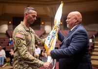 Dr. Carlos Correia assumes responsibility of Product Manager Air Warrior (PdM Air Warrior) during a Change of Charter ceremony on Redstone Arsenal, Alabama, July 16. PdM AW is a product management office within the Program Executive Office Soldier portfolio.