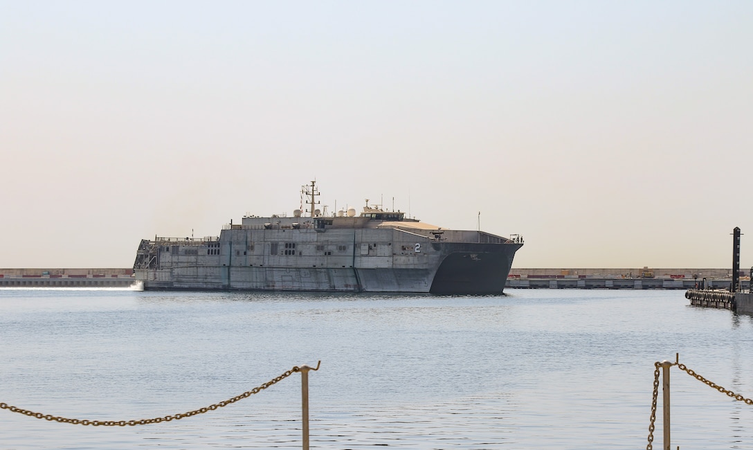 The United States Navy Ship Choctaw County prepares to dock at Kuwait Naval Base, Kuwait, June 10, 2019. (U.S. Army National Guard photo by Staff Sgt. Veronica McNabb)