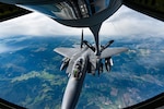 An F-15E Strike Eagle assigned to the 48th Fighter Wing, RAF, Lakenheath, England, is refueled by a U.S. Air National Guard KC-135R Stratotanker from the 155th Air Refueling Wing, Nebraska ANG, Sept. 15, 2021, during exercise Ample Strike 2021, near Pardubice Airport, Czech Republic.