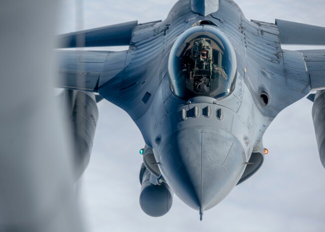 U.S. Air Force Capt. Joseph Christensen, pilot assigned to the 120th Fighter Squadron, gets his aircraft refueled while returning from exercise Amalgam Dart 21-01, June 17, 2021.