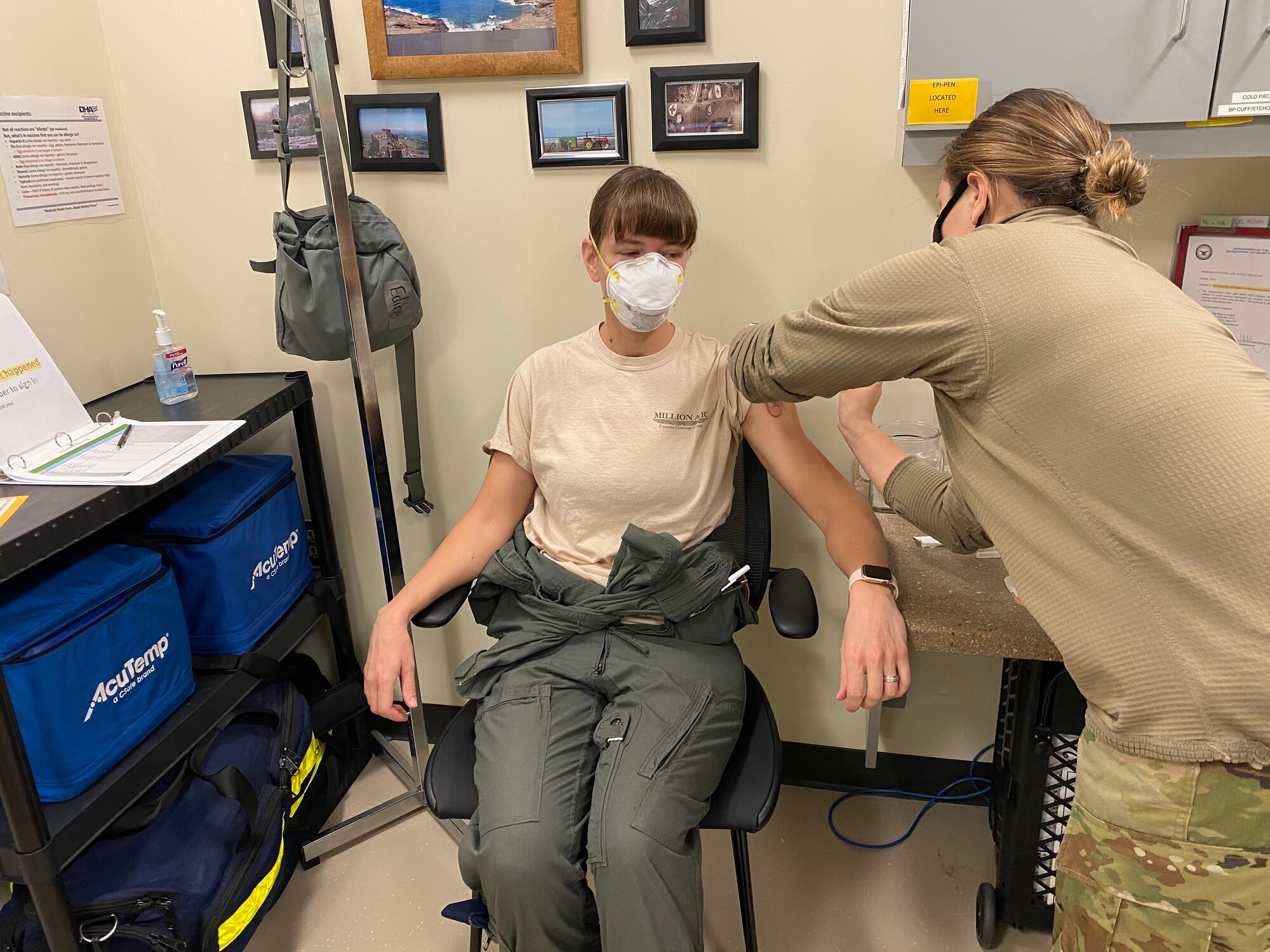 A member of the 128th Air Refueling Wing receives the COVID-19 Vaccine here at 128th Air Refueling Wing, Milwaukee, Feb. 7, 2020. The 128th Air Refueling Wing has begun the distribution of the COVID-19 vaccine in coordination with the U.S. Department of Defense's Operation Warp Speed. (U.S. Air National Guard photo by Master Sgt. Kellen Kroening)