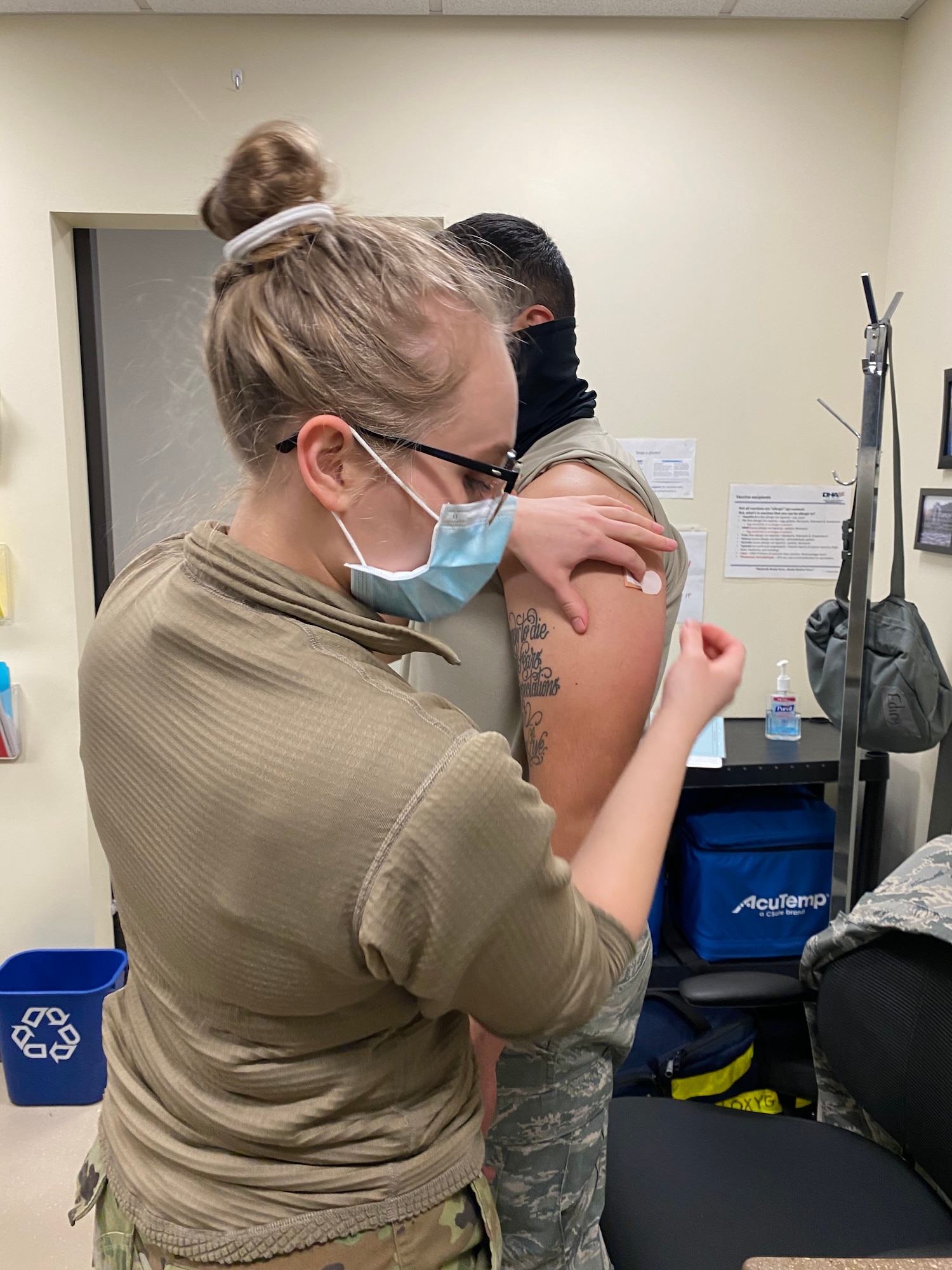 A member of the 128th Air Refueling Wing receives the COVID-19 Vaccine here at 128th Air Refueling Wing, Milwaukee, Feb. 7, 2020. The 128th Air Refueling Wing has begun the distribution of the COVID-19 vaccine in coordination with the U.S. Department of Defense's Operation Warp Speed. (U.S. Air National Guard photo by Master Sgt. Kellen Kroening)